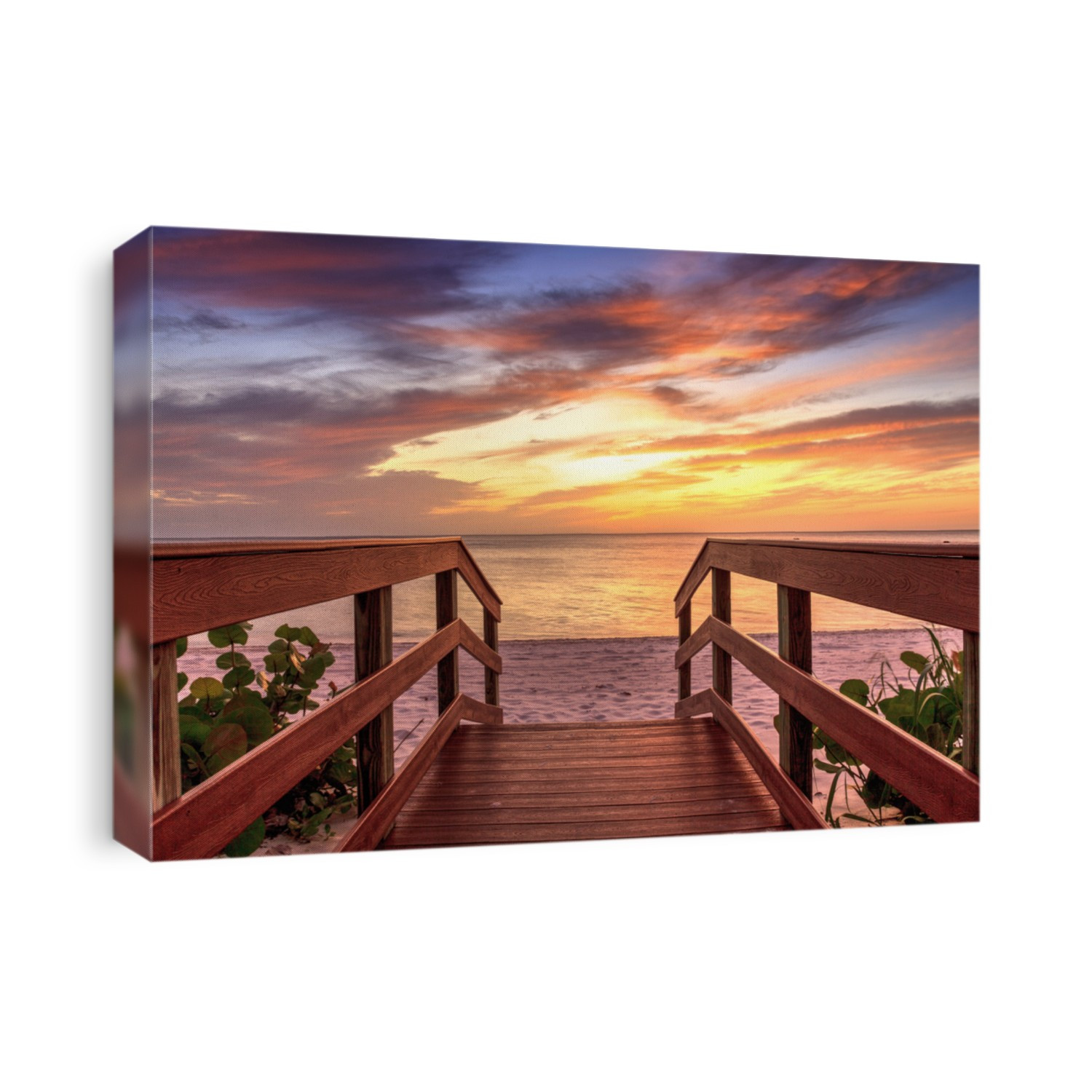 Boardwalk leading to a Sunset over North Gulf Shore Beach along the coastline of Naples, Florida