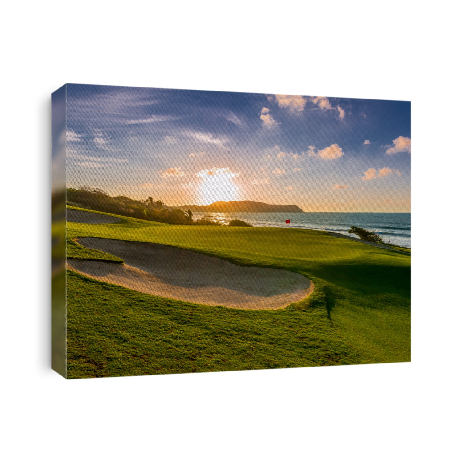 Sand bunkers at the beautiful golf course at the ocean side at sunset, sunrise time.