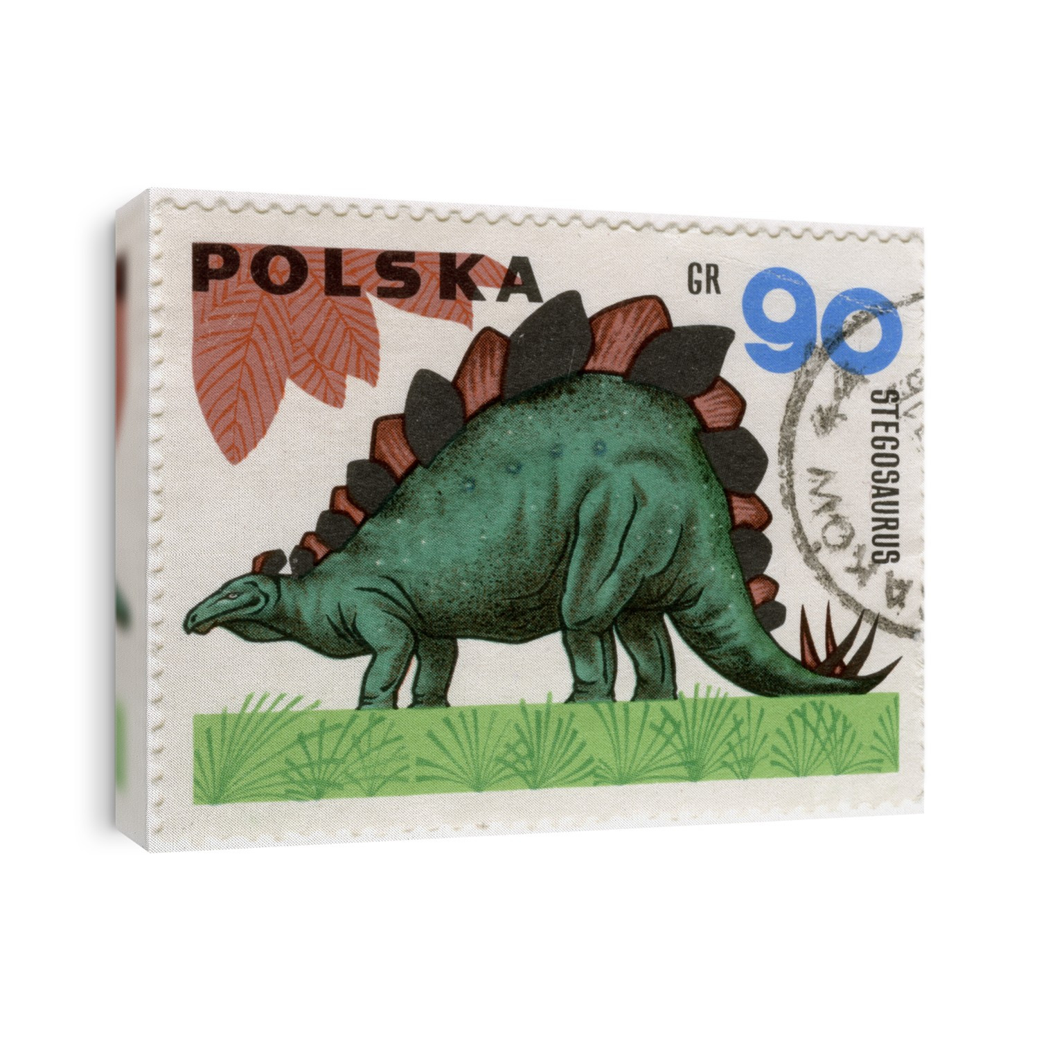 dinosaur (stegosaurus) on a vintage, canceled post stamp from Poland
