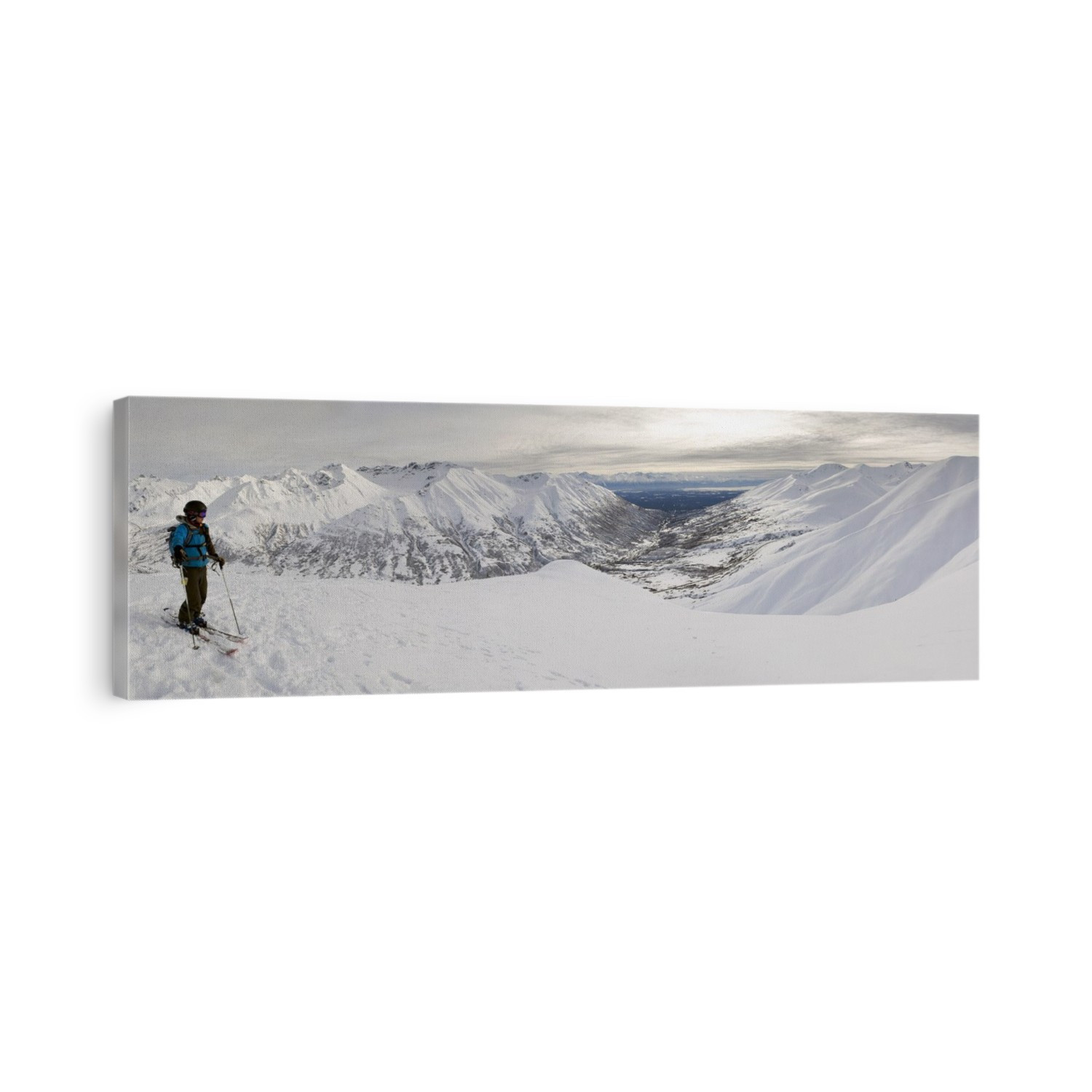 A Backcountry Skier Takes A Moment To Enjoy The View From The Top Of Hatcher Pass, Alaska