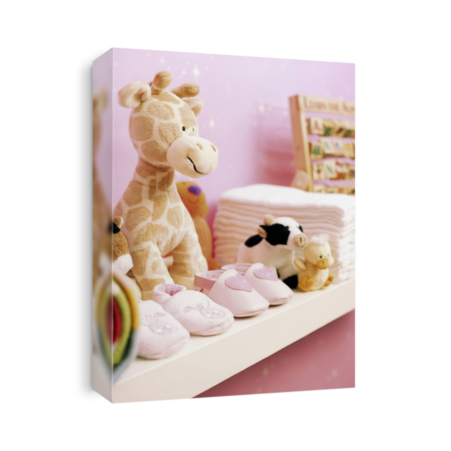 Stuffed toys shoes and nappies on shelf in baby's room