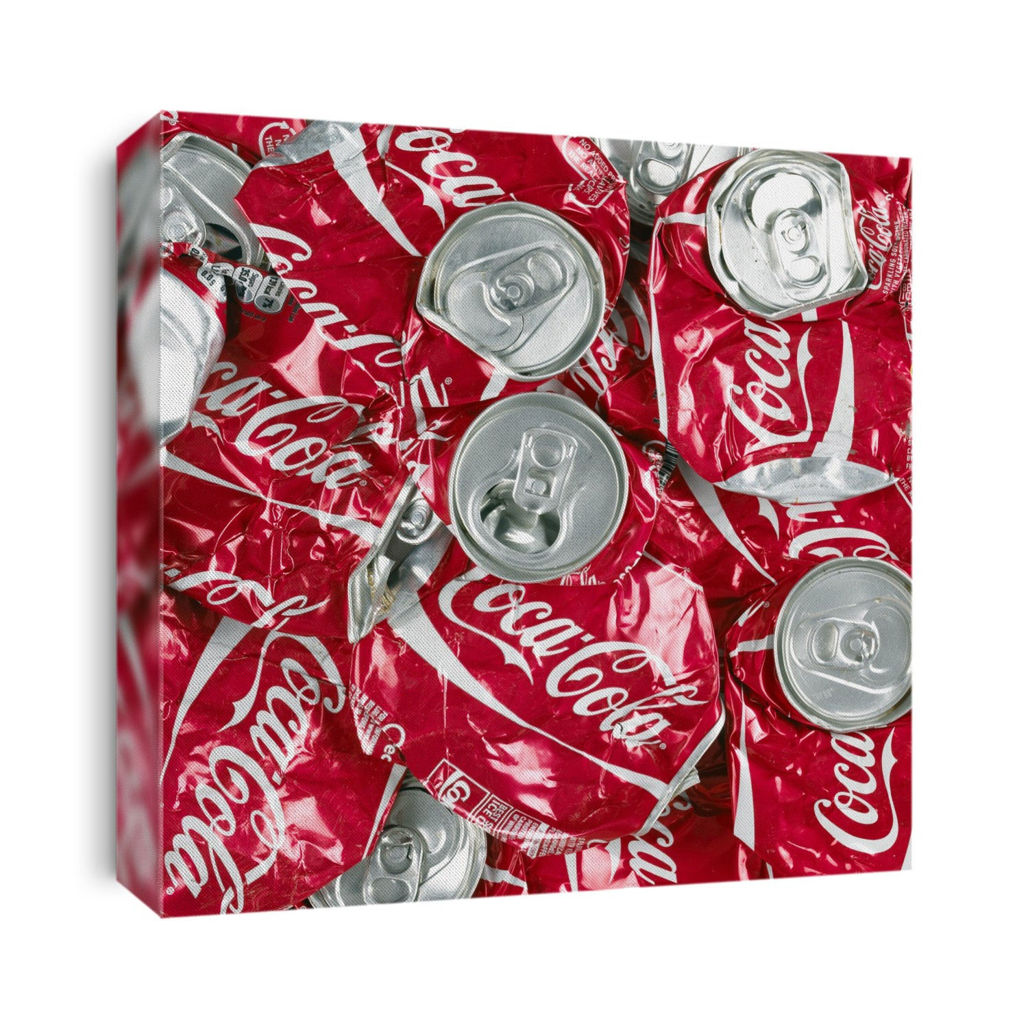 Close-up of crushed Coca Cola cans