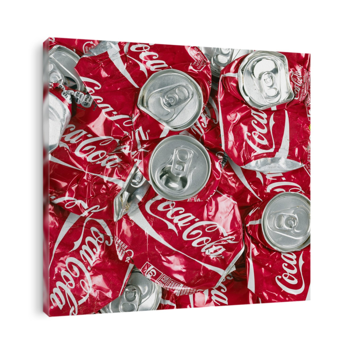 Close-up of crushed Coca Cola cans