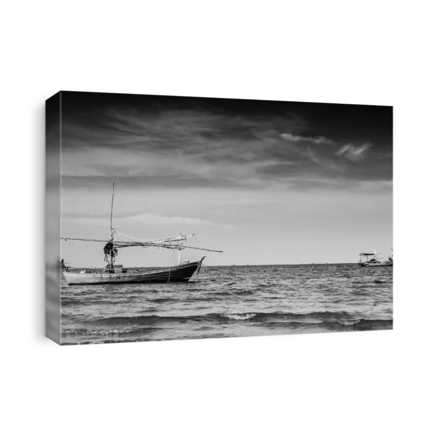 Fishing boats in the Black Sea, classical long tail boat during sunset.