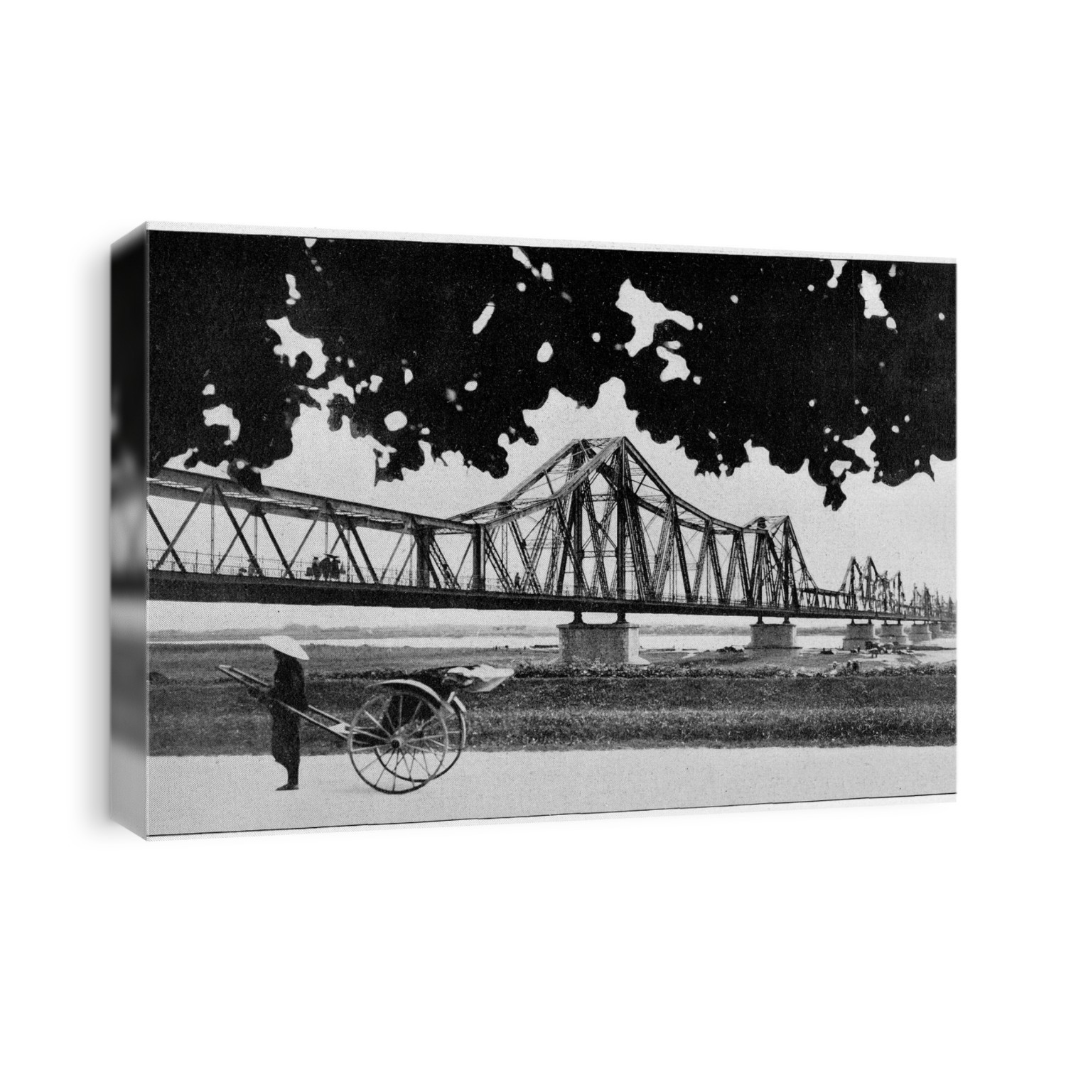 Long Bien Bridge. Historical image of the Long Bien Bridge, over the Red River, Vietnam. This bridge connects the two Hanoi districts of Hoan Kiem and Long Bien. It was built between 1899-1902 by the architects Dayde and Pille or Paris, France. Prior to North Vietnam's independence in 1954 it was called the Paul-Doumer Bridge. Photographed in 1902. Image from Histoire de la locomotion terrestre, by Charles Dollfus and Edgar de Geoffroy, France, 1935.