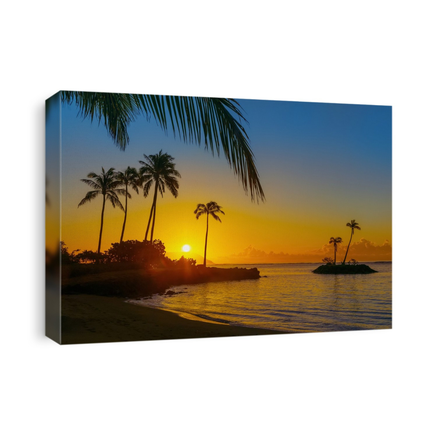 Sunrise at Kahala Beach, Waiʻalae Beach Park, with a glowing yellow sun and warm coloured lights reflected in the tranquil water; Oahu, Hawaii, United States of America