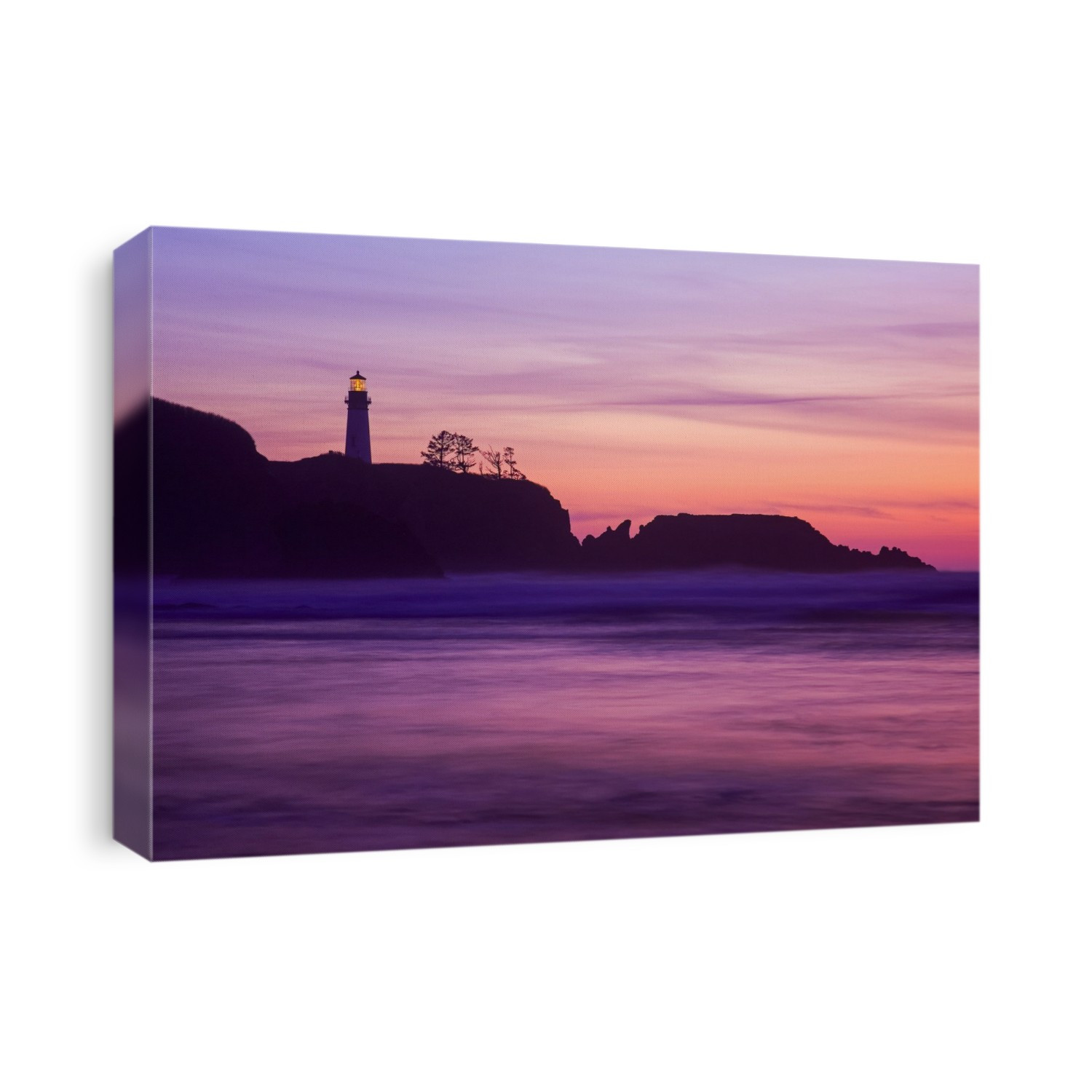 Sunset along beach and Yaquina Head Light; Oregon, United States of America