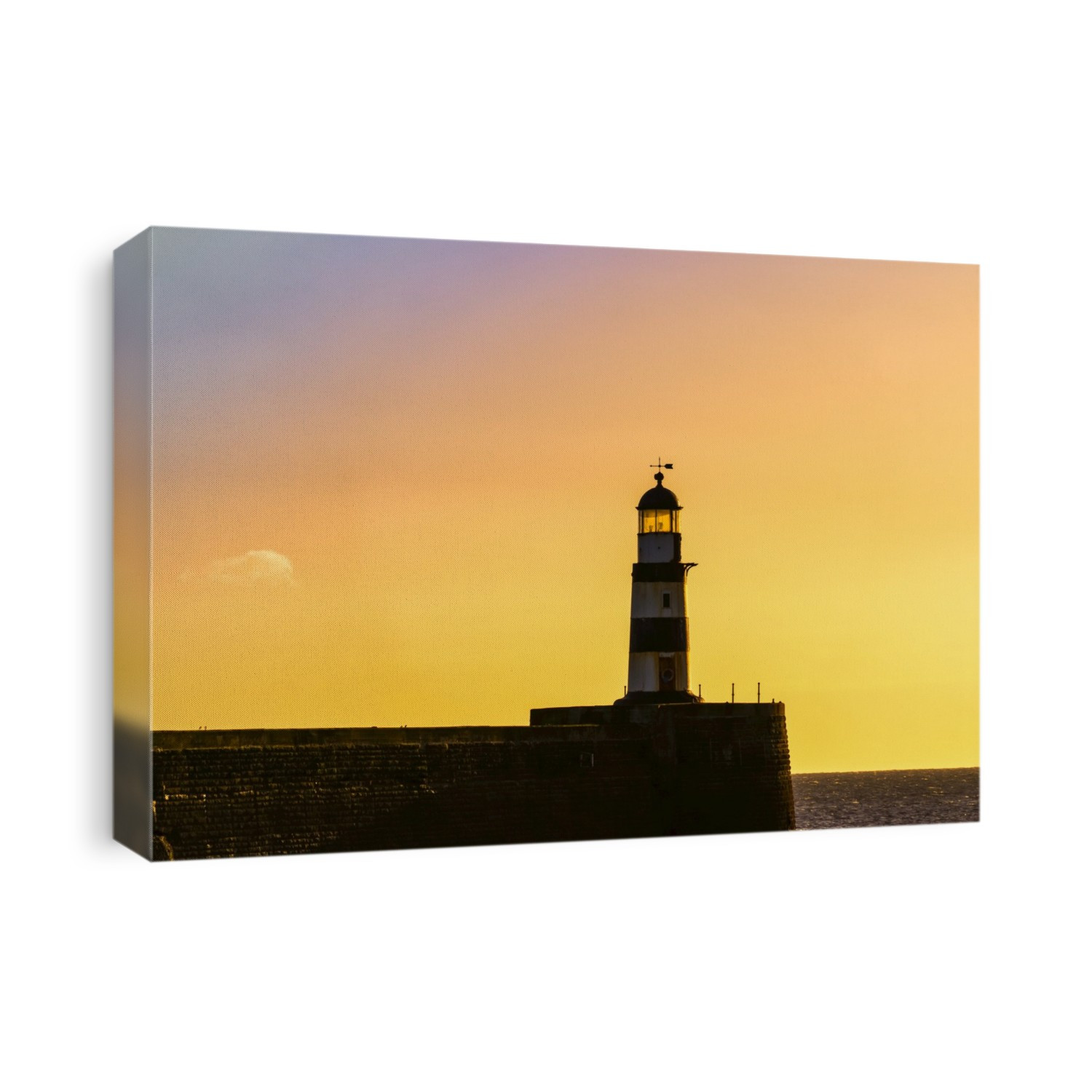 Lighthouse with golden sky at sunset; Seaham, Durham, England
