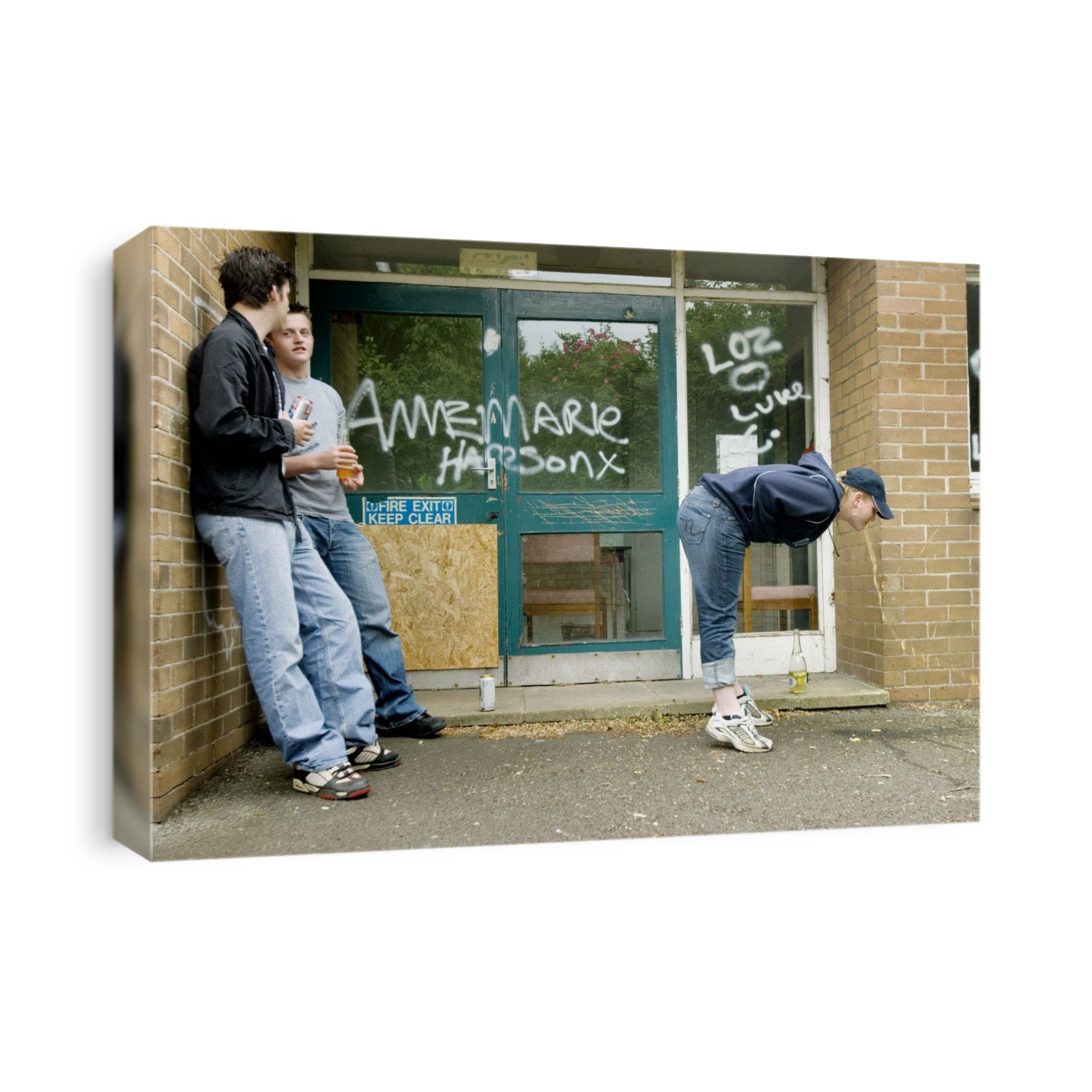 MODEL RELEASED. Teenager vomiting after drinking alcohol.