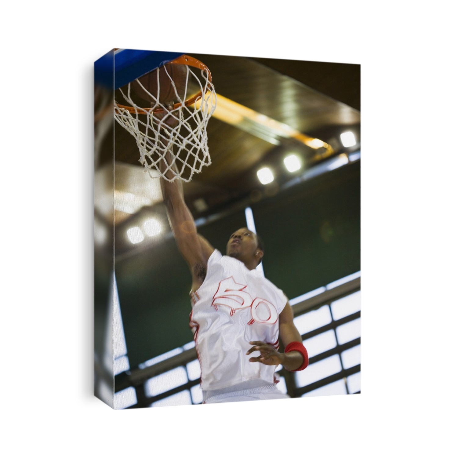 MODEL RELEASED. Basketball player scoring a point.
