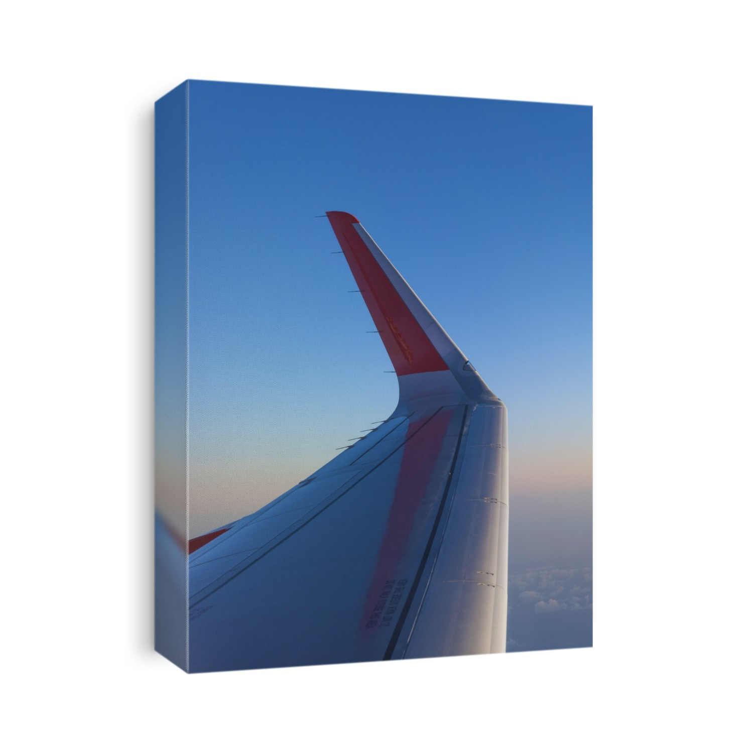 Winglet on a passenger airliner cruising at high altitude. Winglets improve the efficiency of the wing by reducing the lift-induced drag caused by wingtip vortices.