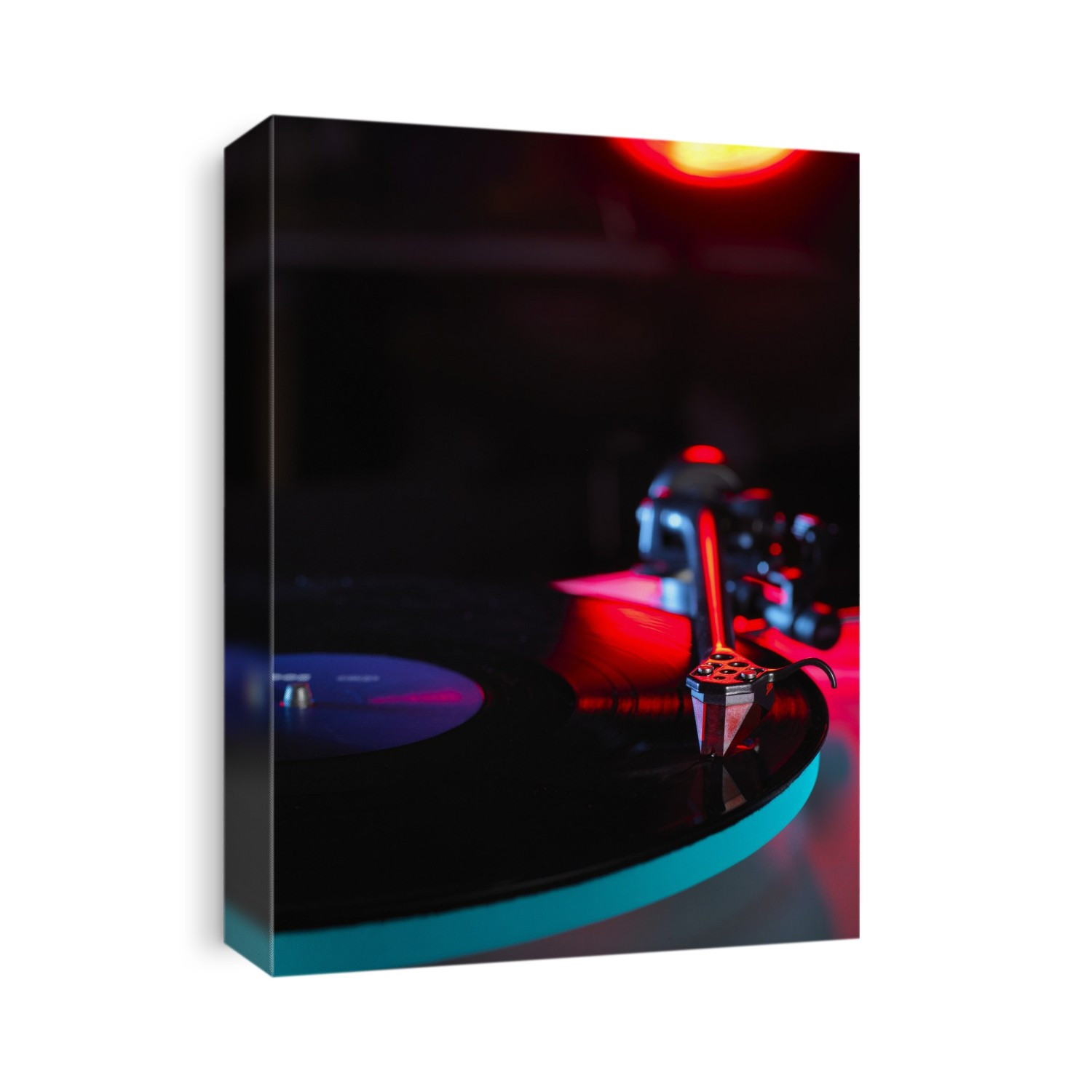 Close up of a stylus playing a vinyl record.