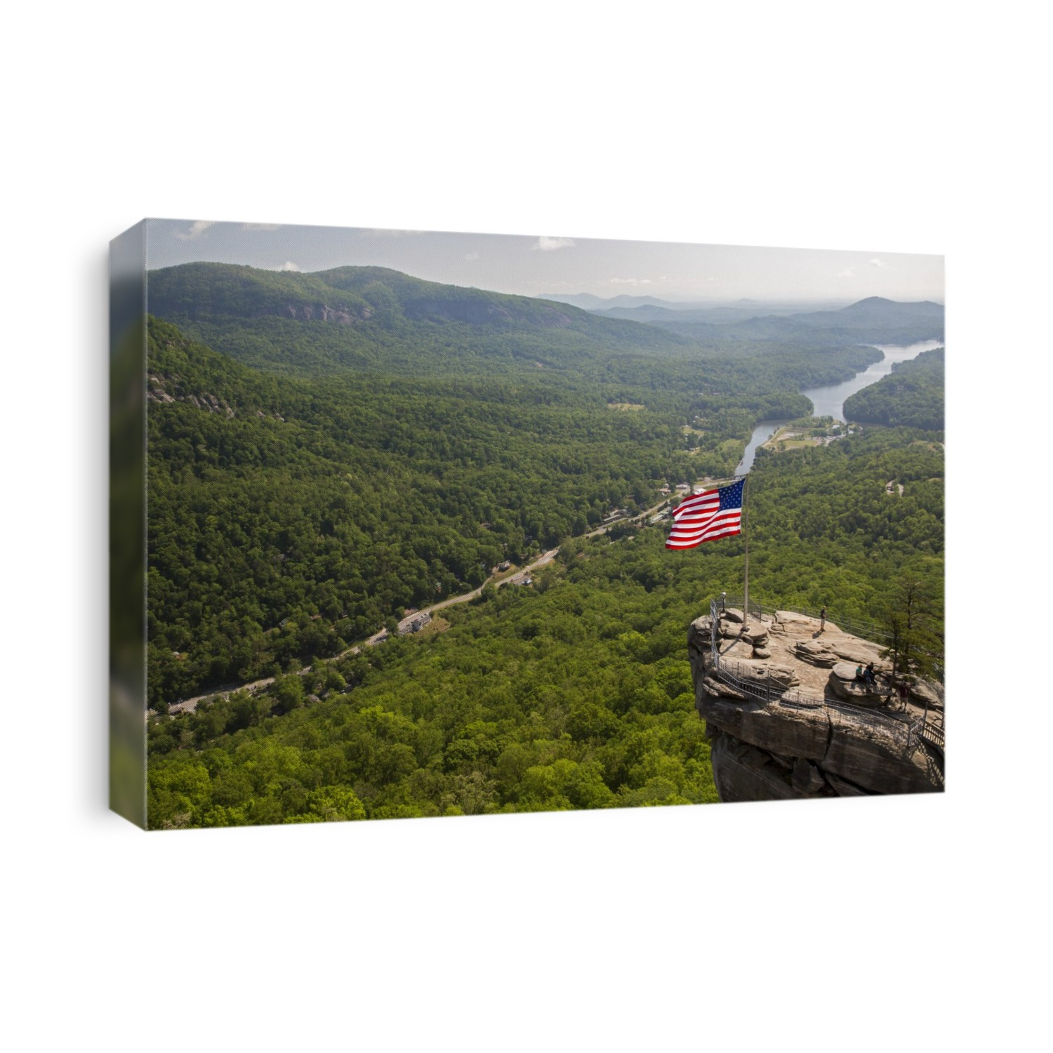 Chimney Rock viewing platform. Landscape and viewing platform on Chimney Rock, a 535-million-year-old rock spire and tourist attraction in Chimney Rock State Park, North Carolina, USA. The viewing platform looks out over the surrounding area and Lake Lure. Photographed in April 2016.