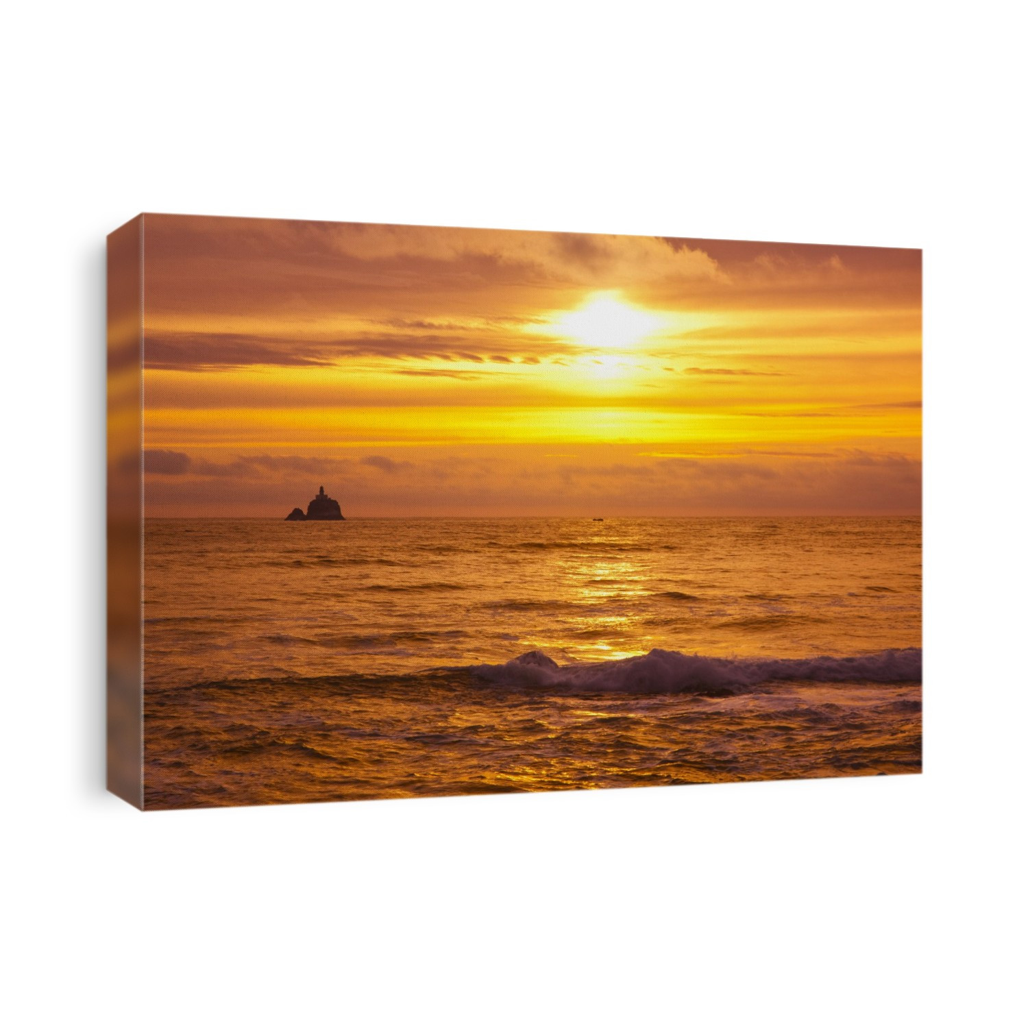 Vibrant sunset and view of Tillamook Rock Lighthouse from Indian Beach; Oregon, United States of America