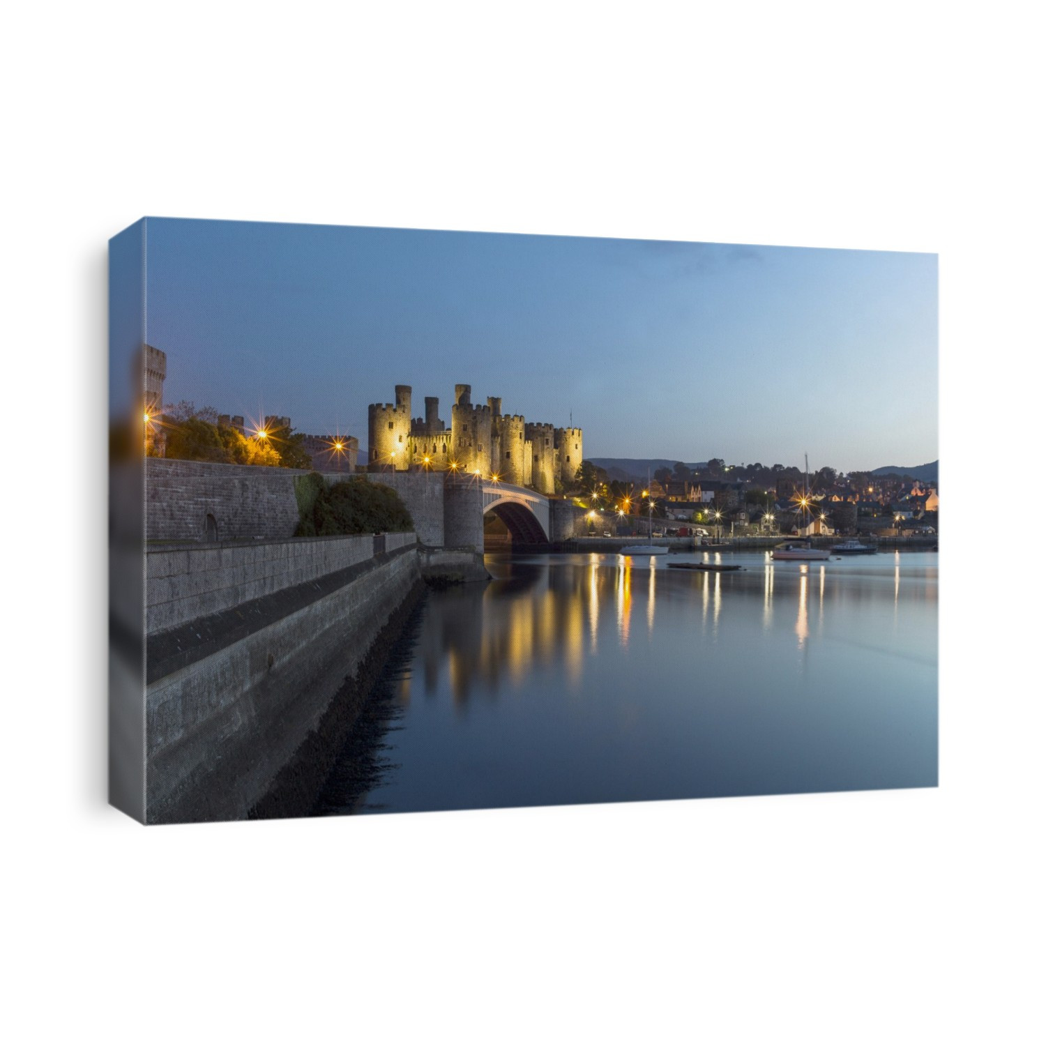 A view toward Conwy castle at night.