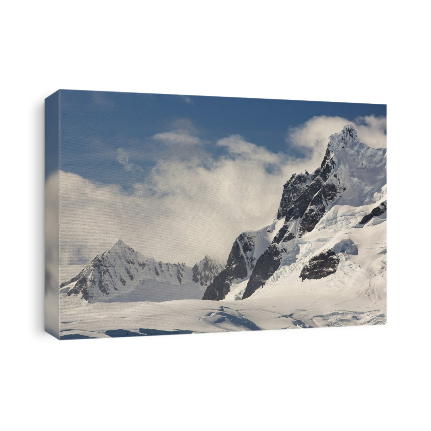 Mountains on the Antarctic Peninsular from the Gerlache Strait which separates the Palmer Archipelago from the Antarctic Peninsular off Anvers Island. The Antarctic Peninsular is one of the fastest warming areas of the planet.