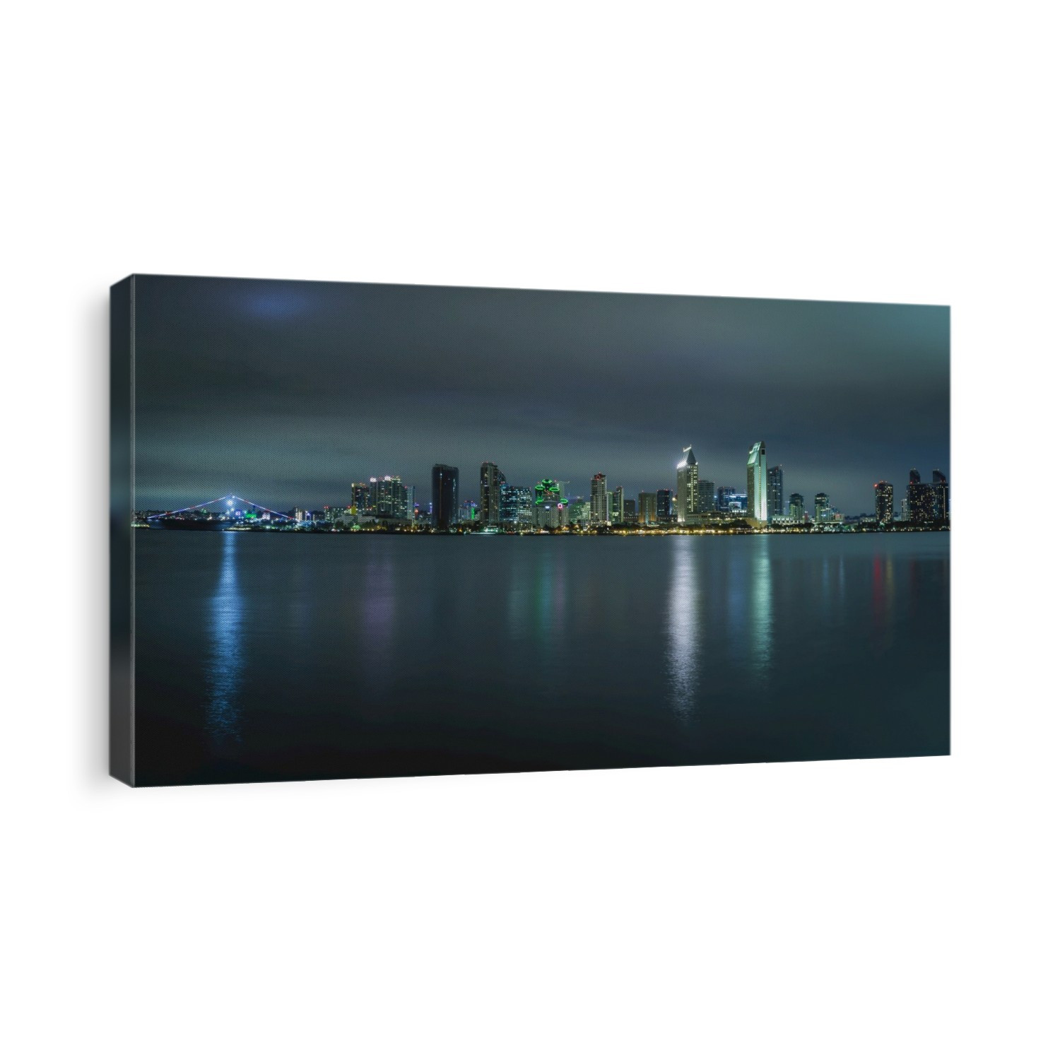 San Diego skyline illuminated at night with reflections on the Bay; San Diego, California, United States of America
