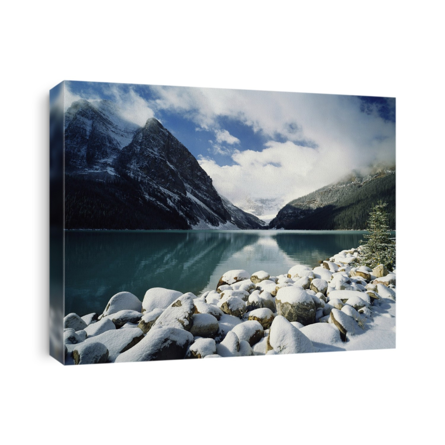 Snow-covered rocks at Lake Louise in Banff National Park; Alberta, Canada