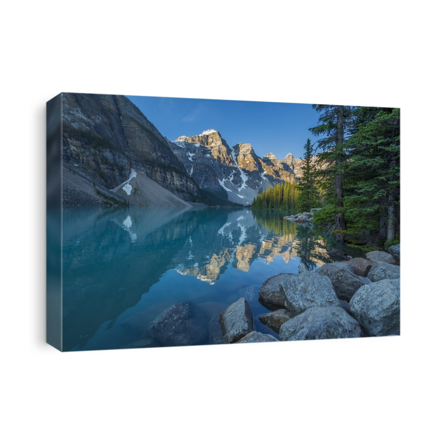 Valley of the Ten Peaks reflected in the tranquil water of Moraine Lake under a bright blue sky in Banff National Park; Alberta, Canada