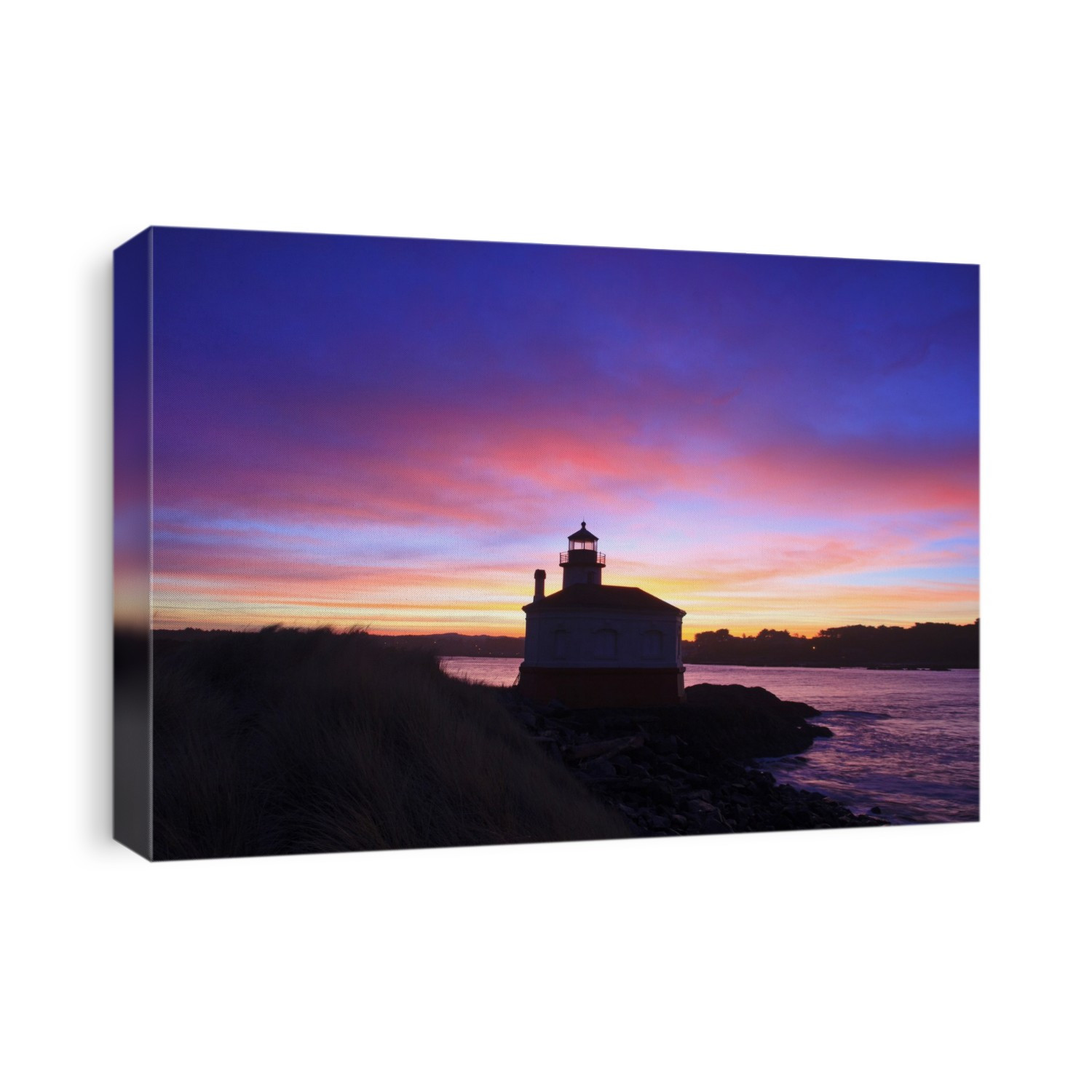 Coquille River Light on the rugged and rocky Oregon coast with golden sunrise light over the horizon; Bandon, Oregon, United States of America