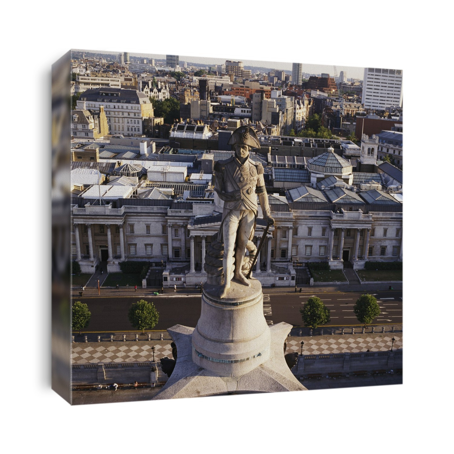 Nelson's Column, aerial photograph. Nelson's Column was built between 1840 and 1843 to commemorate Admiral Horatio Nelson, who died defeating the Spanish Navy at the Battle of Trafalgar. The statue is 5.5m high and stands on a column 56m high. The buidling seen immediately the statue is the National Gallery. Photographed in Trafalgar Square, London, UK.