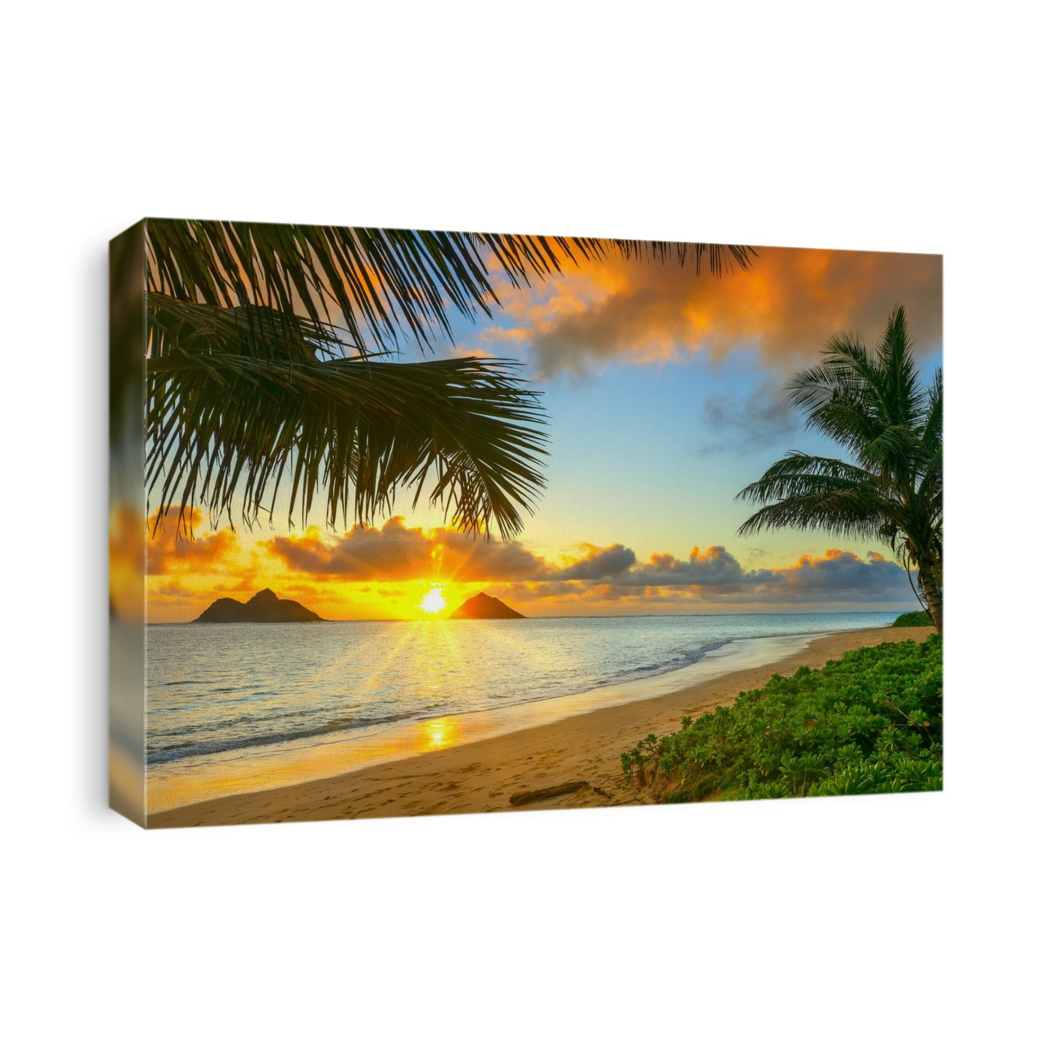Sunrise viewed from Lanikai Beach with a view of the Mokulua Islands off the coast; Oahu, Hawaii, United States of America