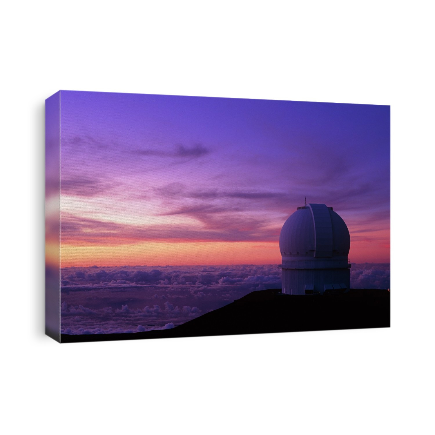 Sunset at Mauna Kea. The dome of the Canada- France-Hawaii Telescope (CFHT) at the Mauna Kea Observatory seen against the light of the setting Sun. The CFHT is a 3.6-metre optical telescope, sited at the summit of the 4200-metre volcanic mountain of Mauna Kea in Hawaii.