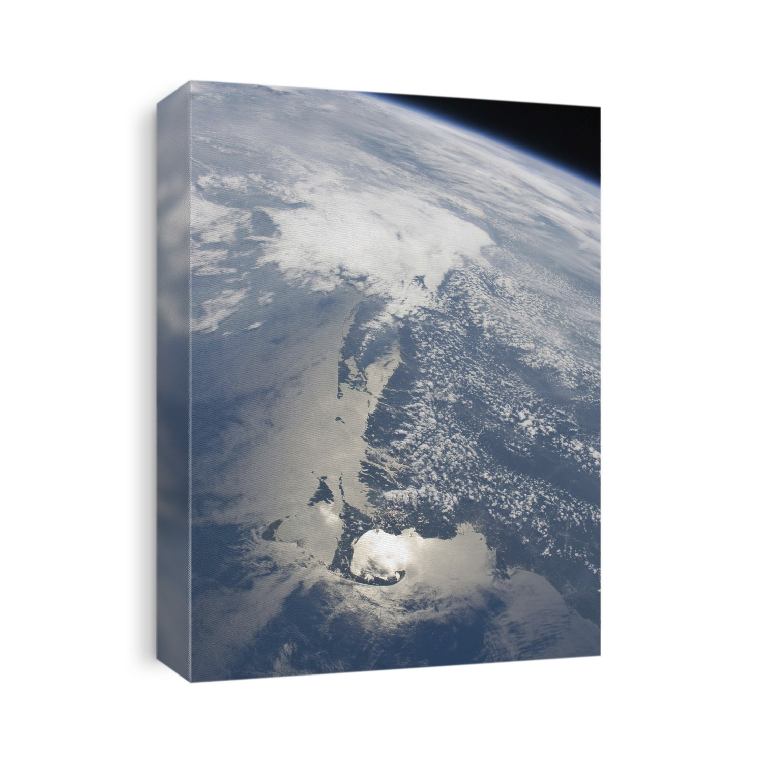 Massachusetts, USA, coastline from the International Space Station (ISS). The sunlight is reflecting off the water at the same angle as the camera is viewing the water, causing sunglint. The brightest area is within Cape Cod Bay.
