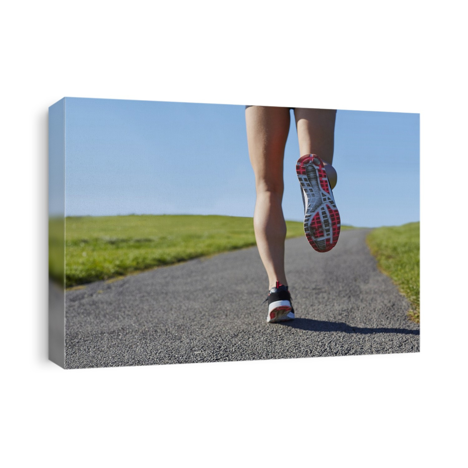 Woman jogging on a path.