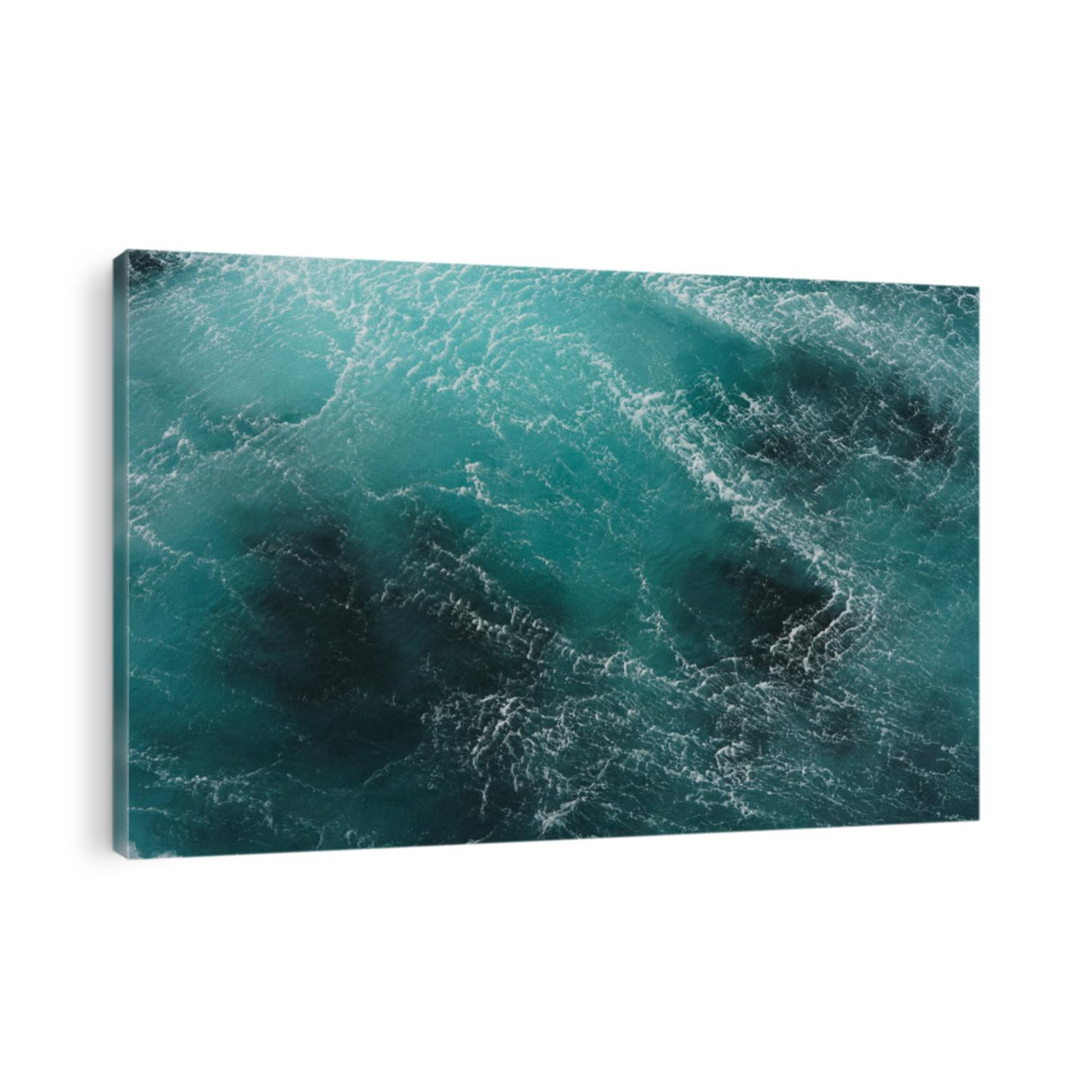 background pacific ocean during a typhoon, bright blue color of sea splashing wave, texture of sea foam. abstraction of ripped water waves in the ocean in a storm sunlight. turbulent ocean composition