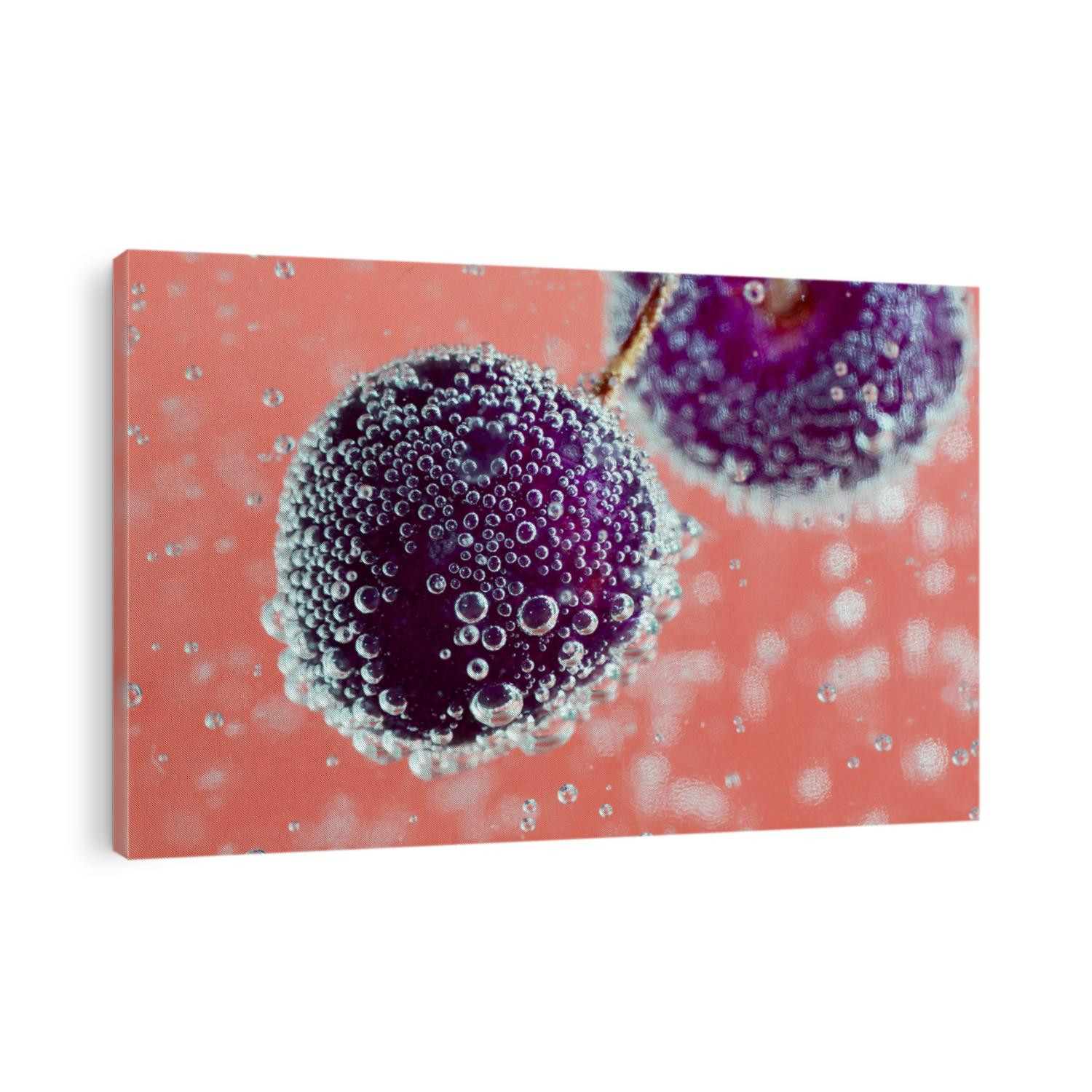 Sparkling cherries. An image of cherries covered with bubbles in the water. The color tone of the background is changed to orange