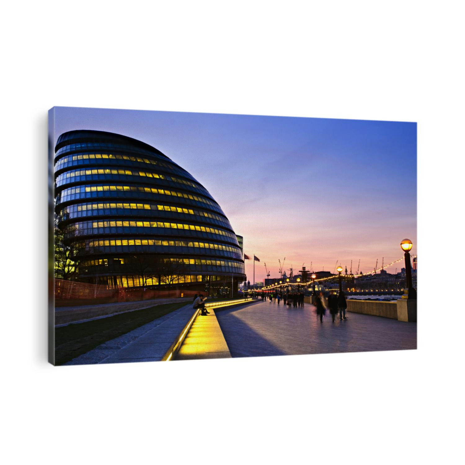 New London city hall at night with pedestrians on sidewalk