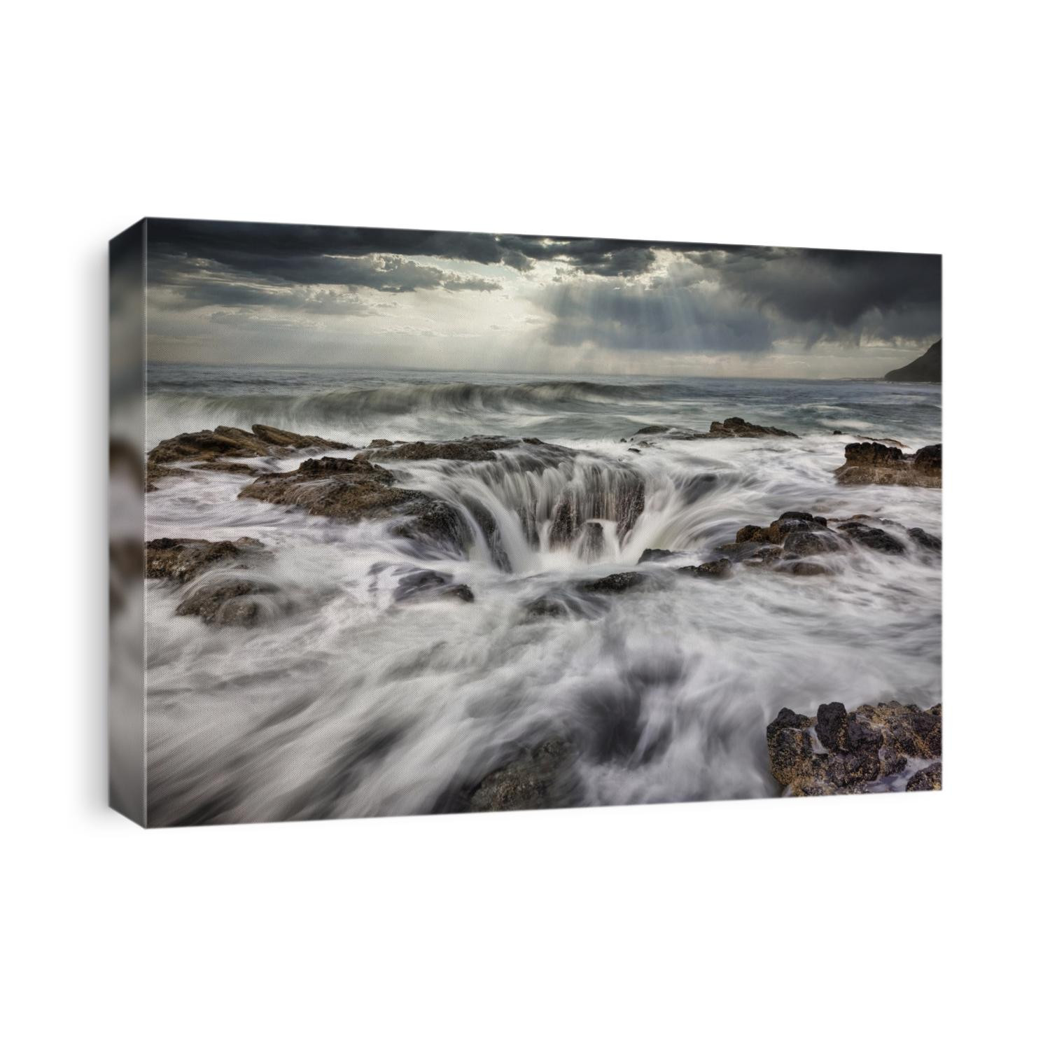 Waves crashing into Thors Well on the Oregon Coast