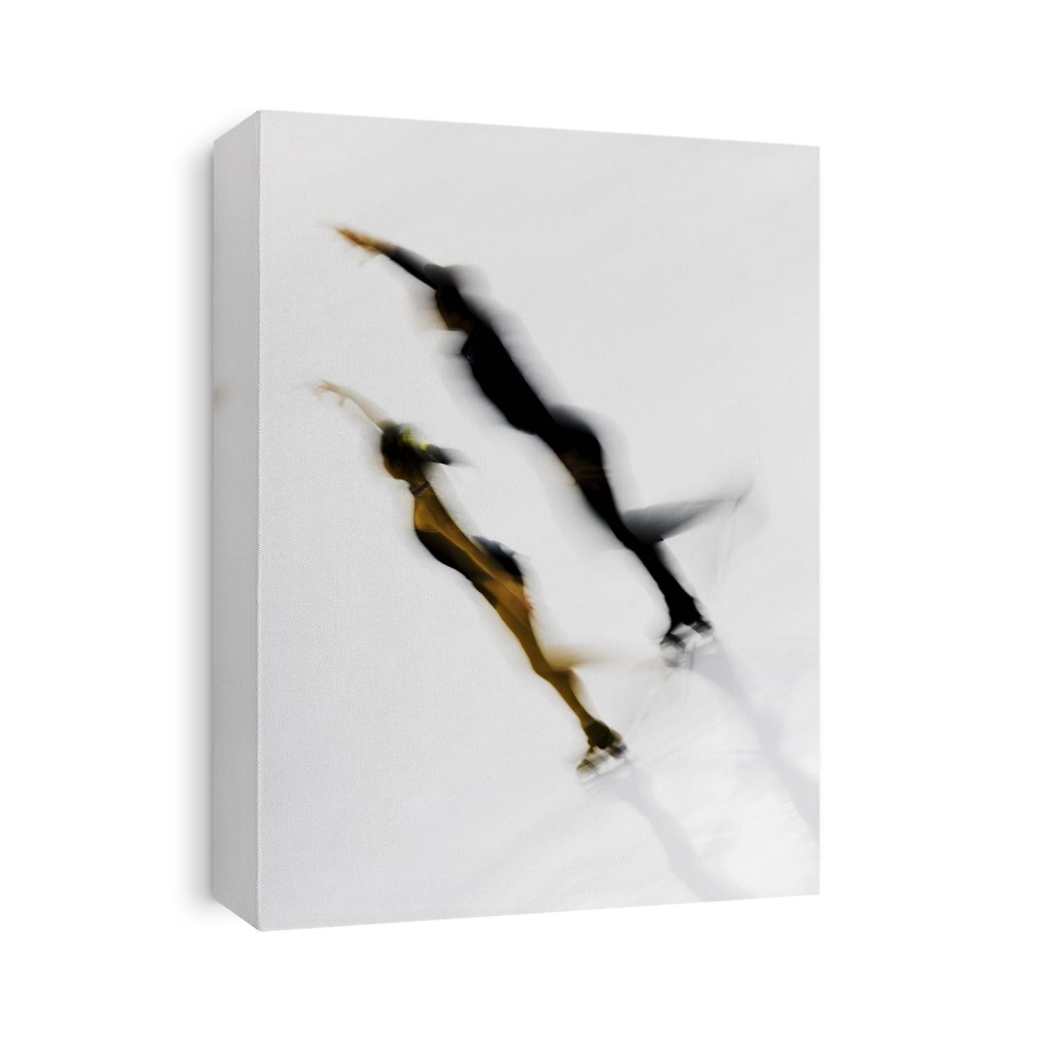 Blurred action of pairs figure skaters.