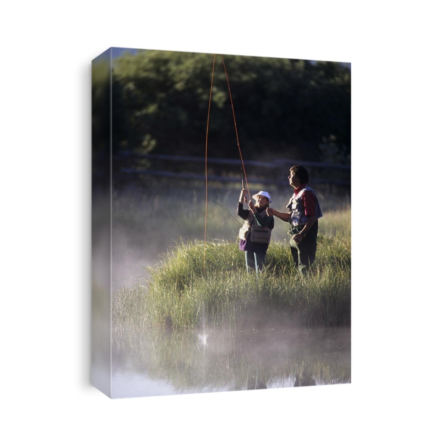 Father fly fishing with his daughter.