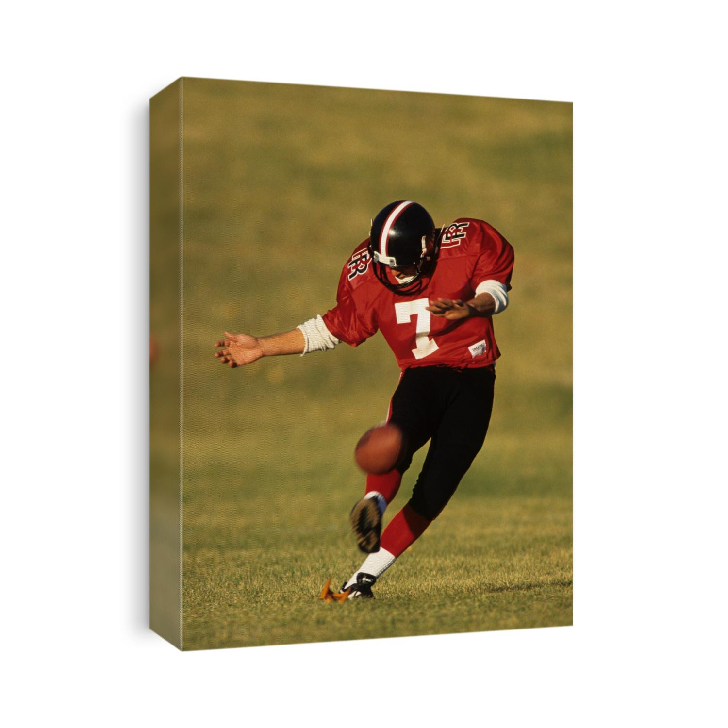 Football place kicker in action