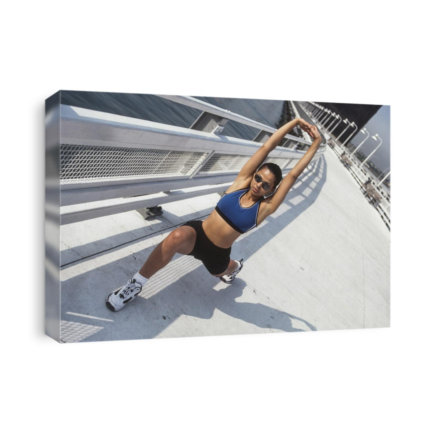 Women stretching outdoors.