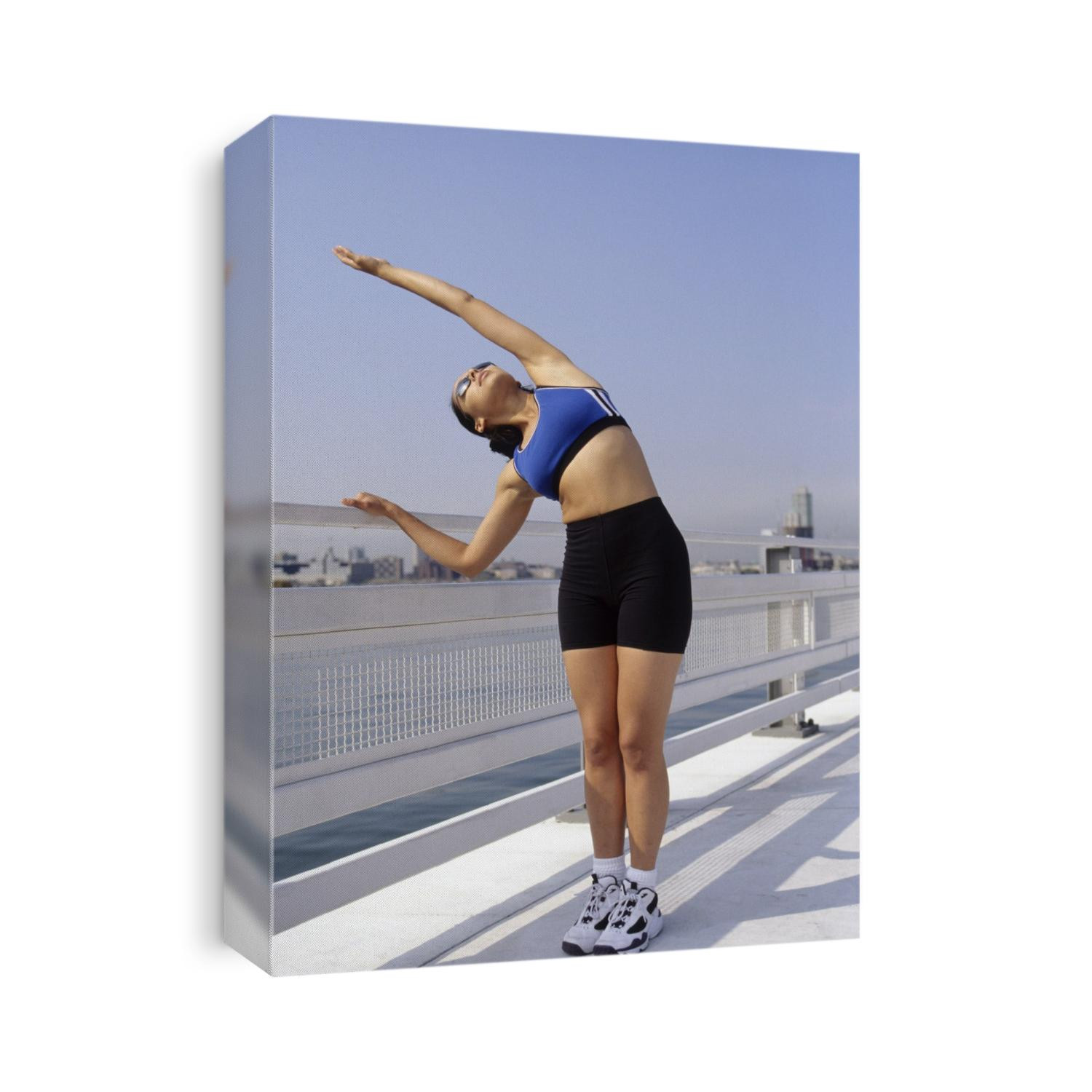 Woman stretching outdoors.