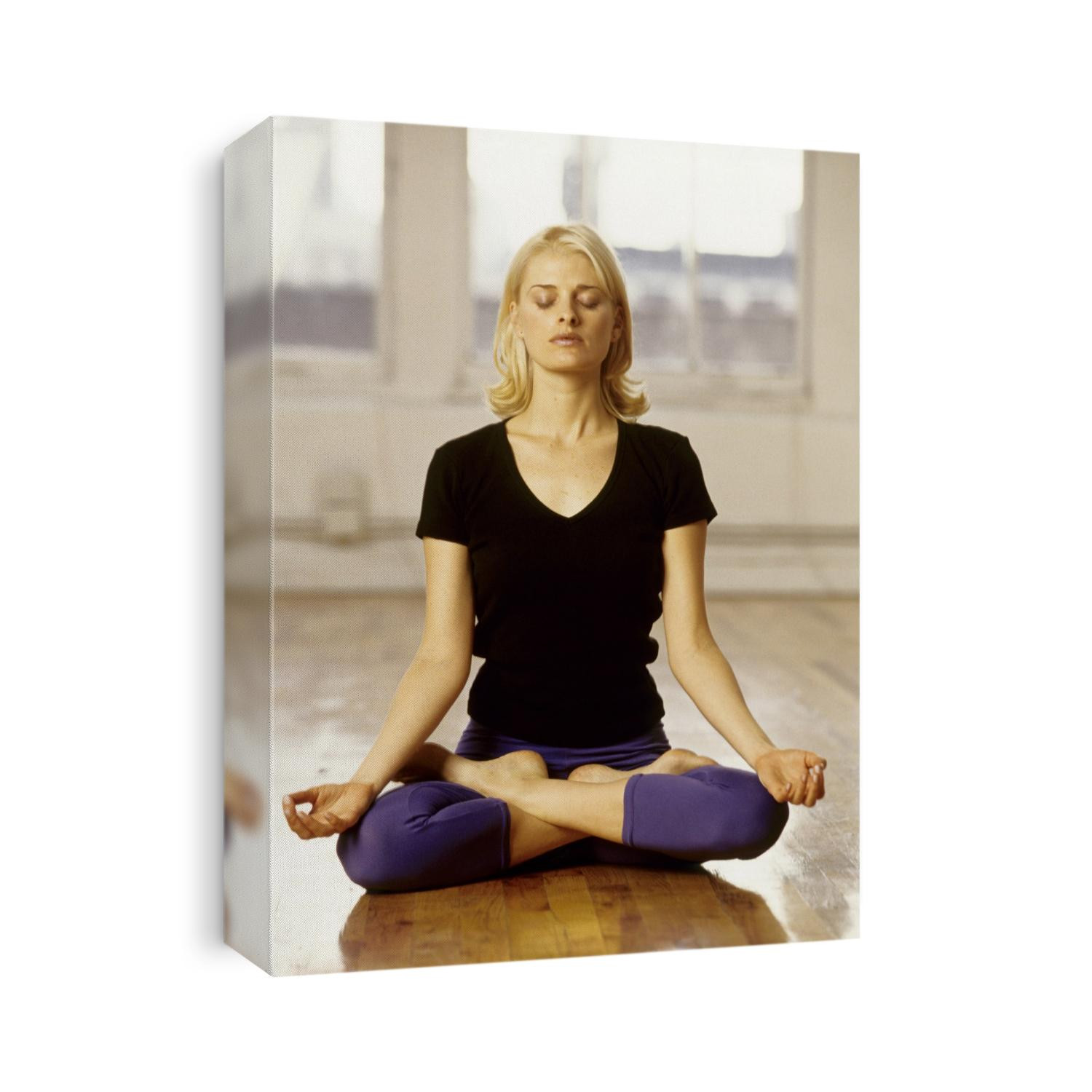 Young woman in yoga position.