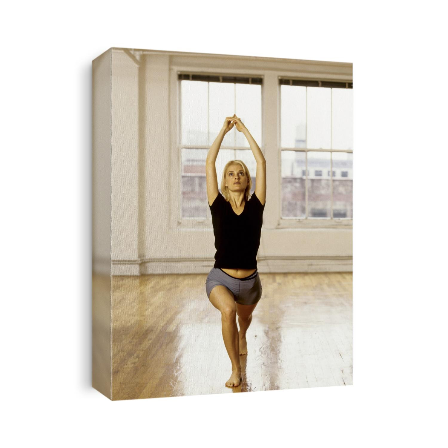 Young woman in yoga position.