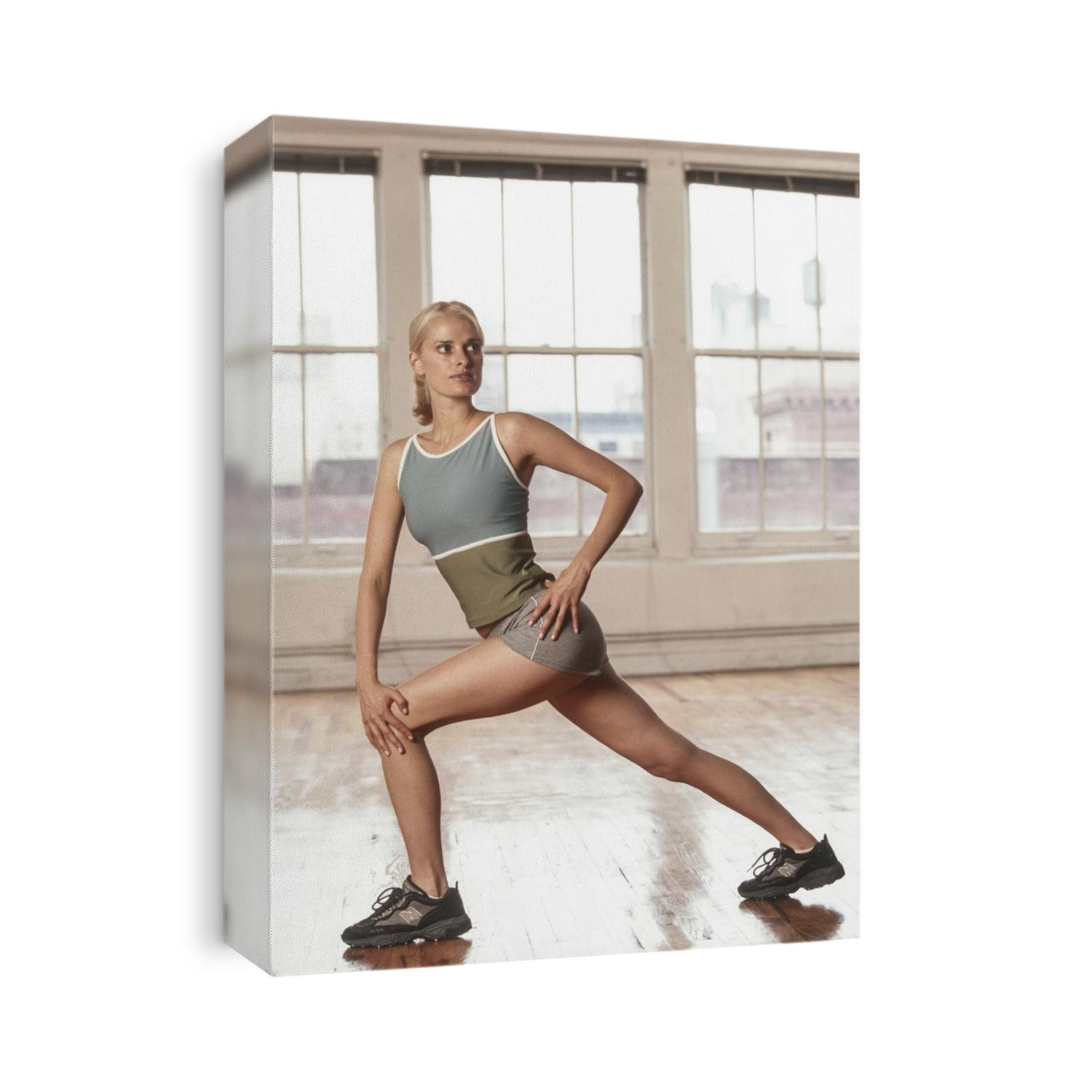 Young women stretching during exercise session.