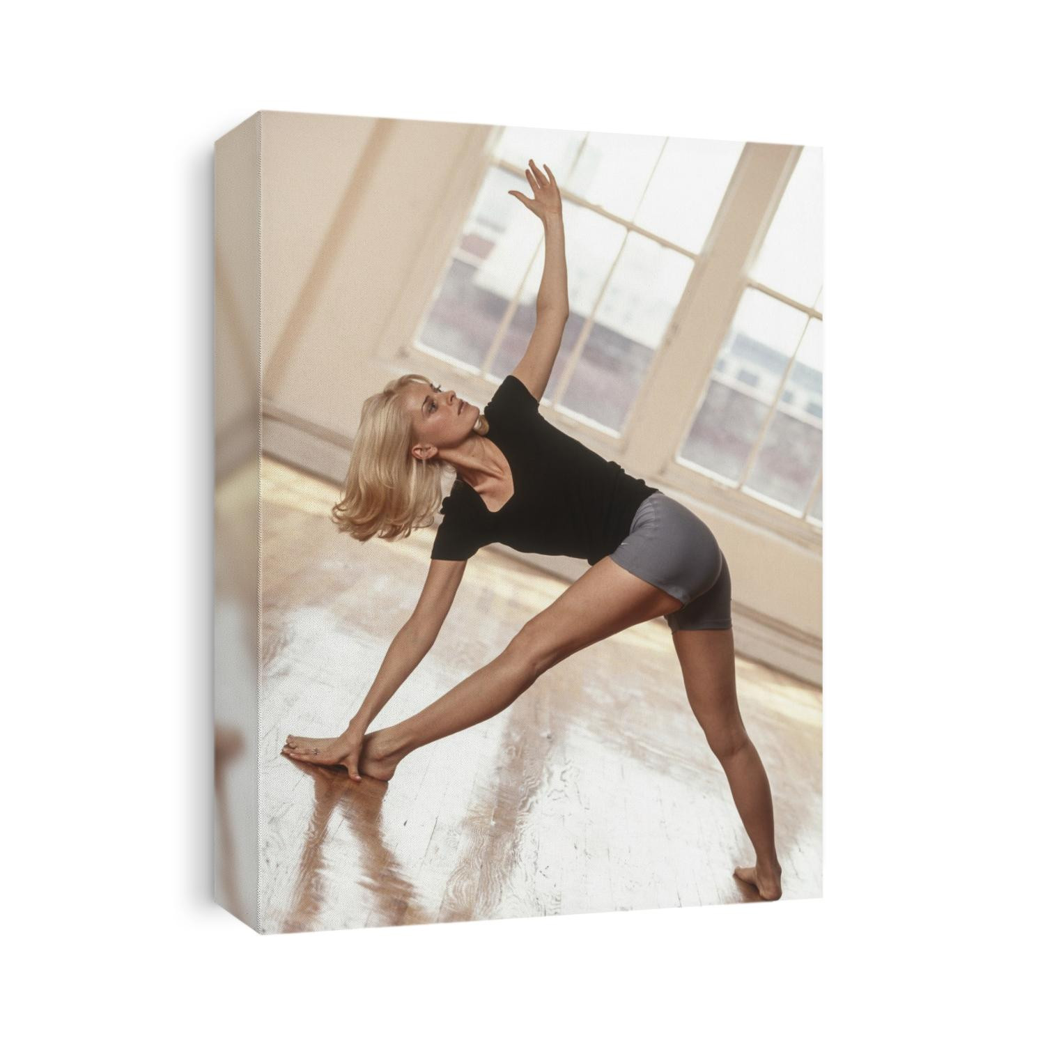 Young woman in yoga position.