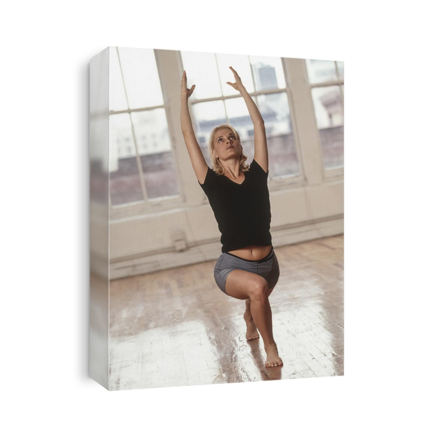 Young woman in yoga position.