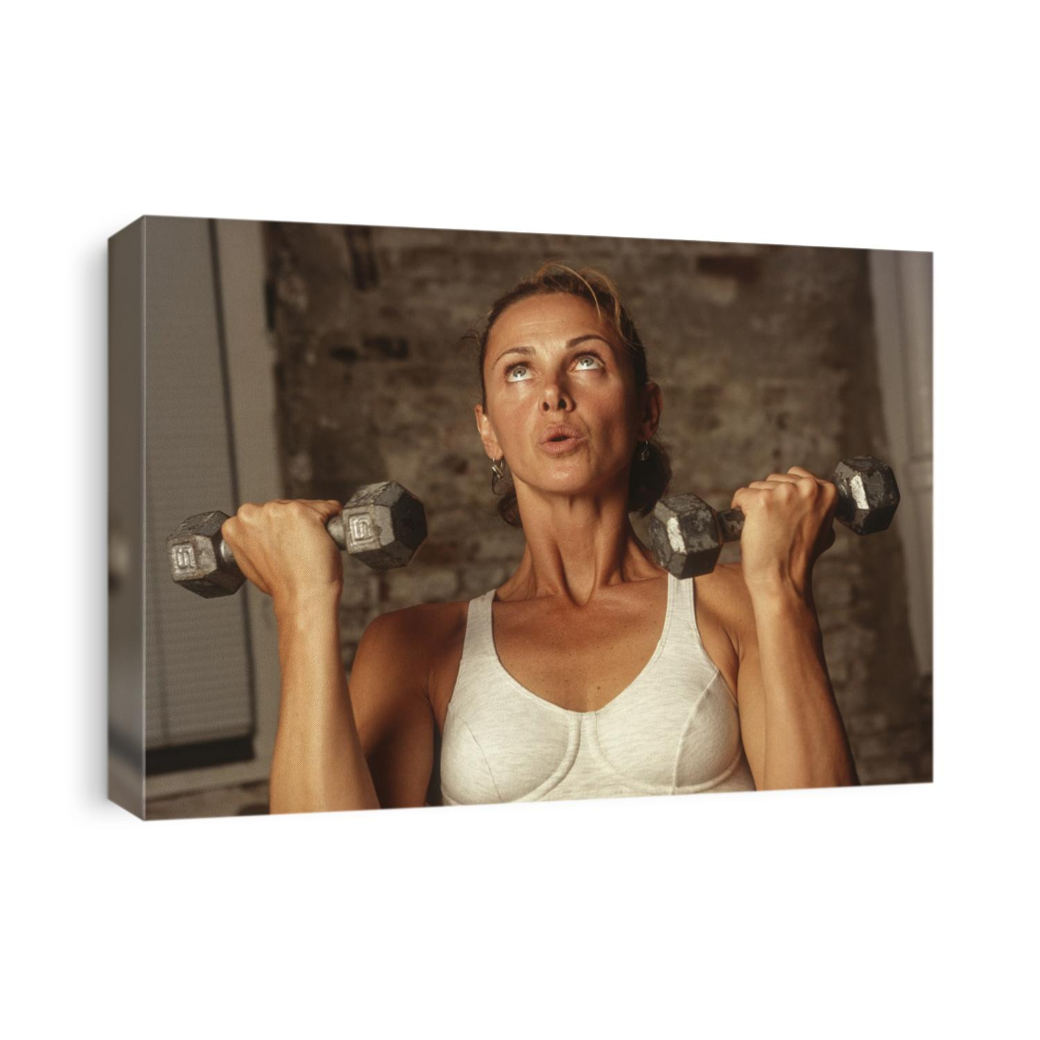 Women working out with hand weights.