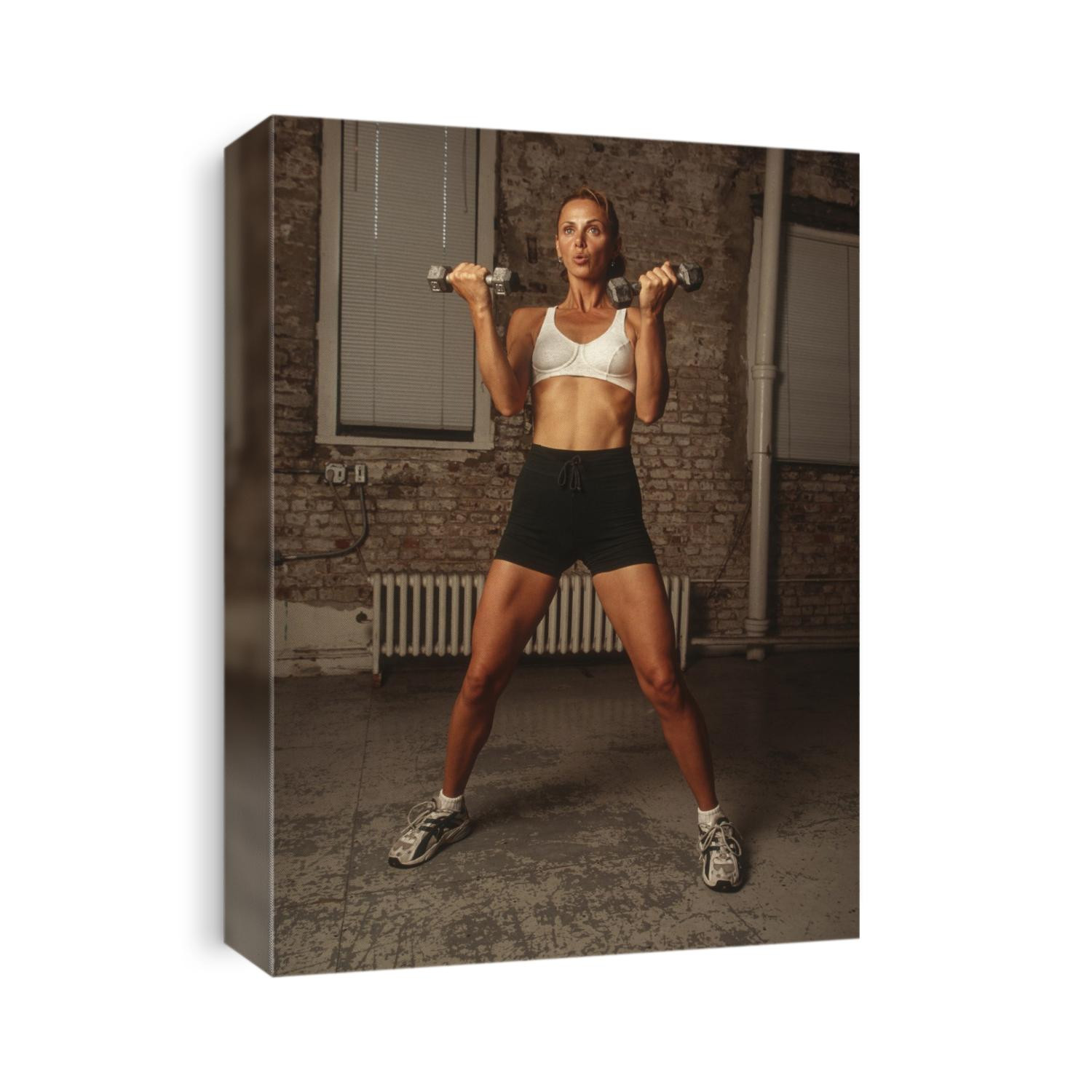 Women working out with hand weights.