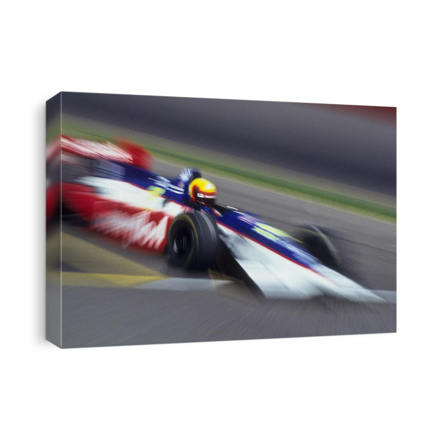 Blurred auto racing action.