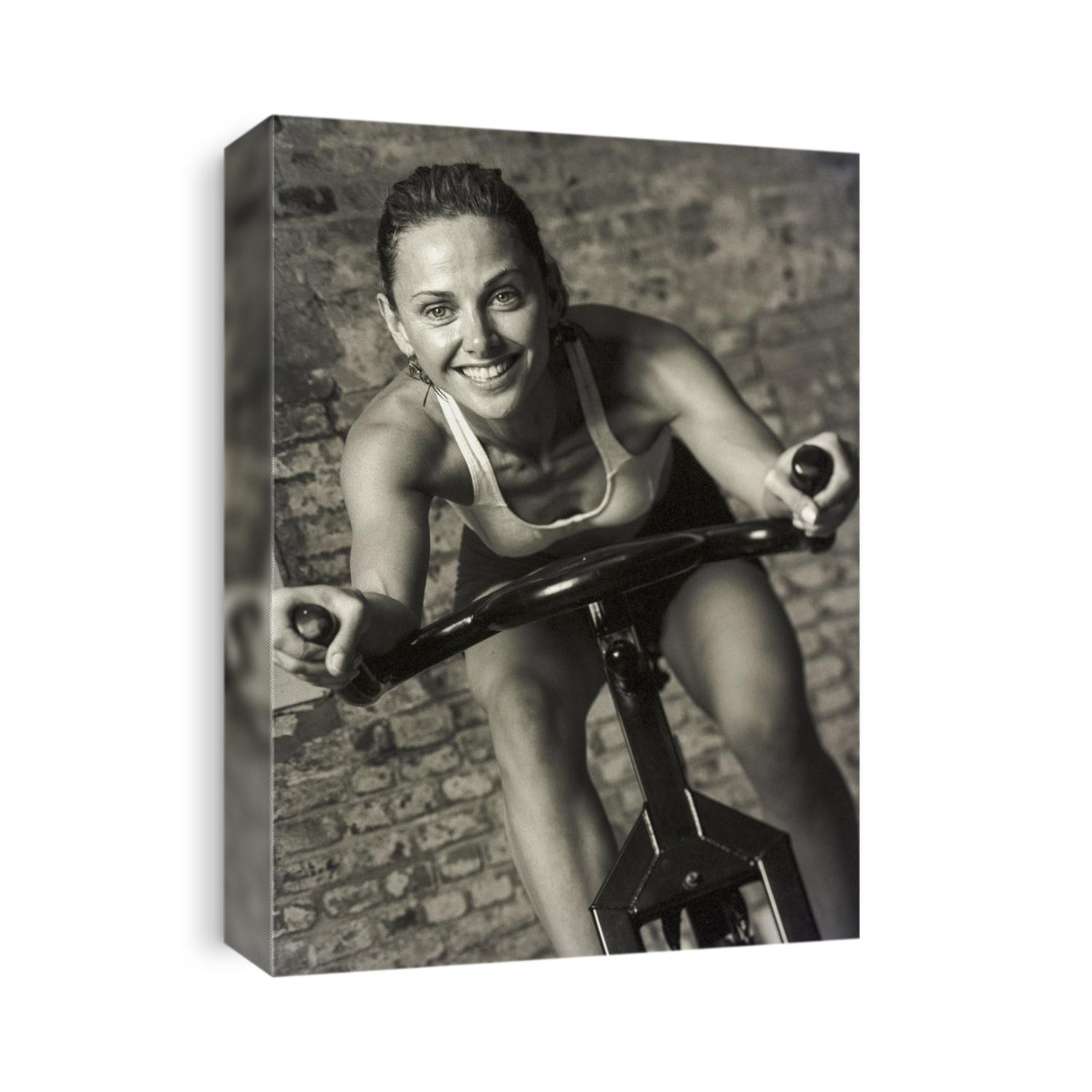 Woman exercising on a stationary bike.