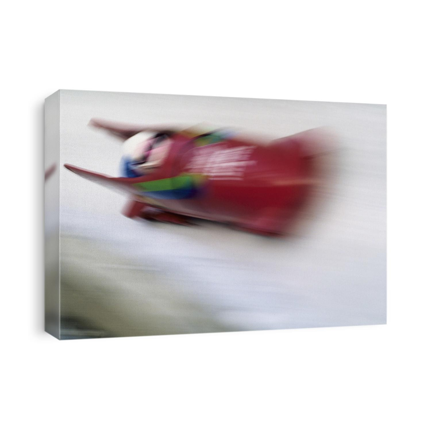 Blurred action of two man bobsled