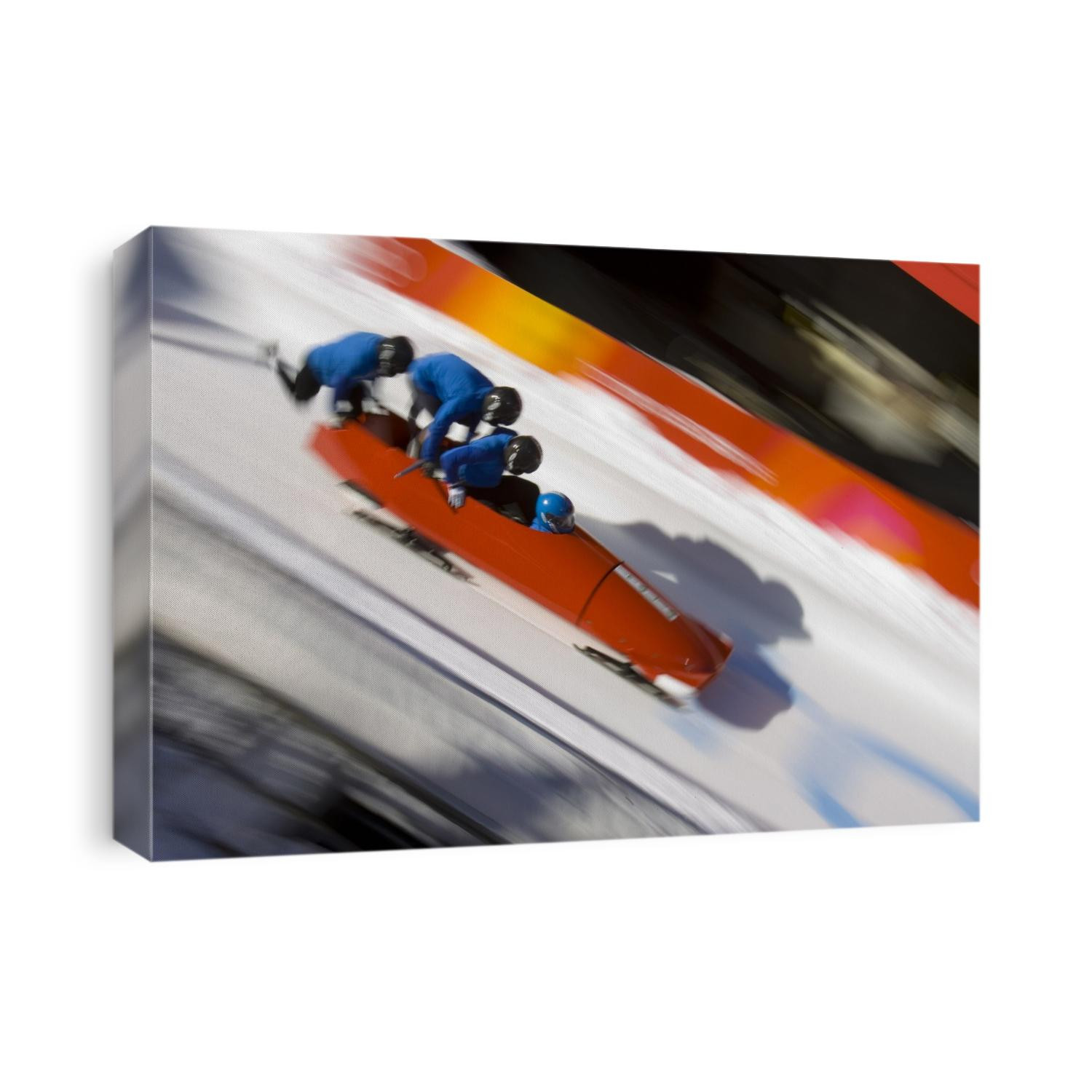 Start of a 4-man bobsled team in action