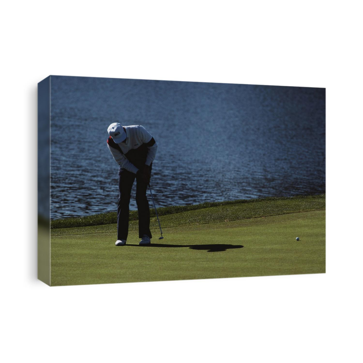 Golfer putting.